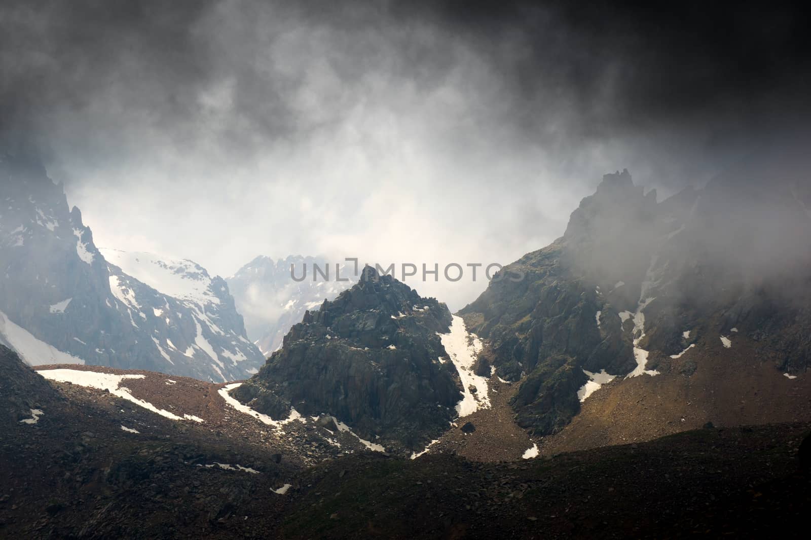 Storm clouds in the high mountains in Alps 