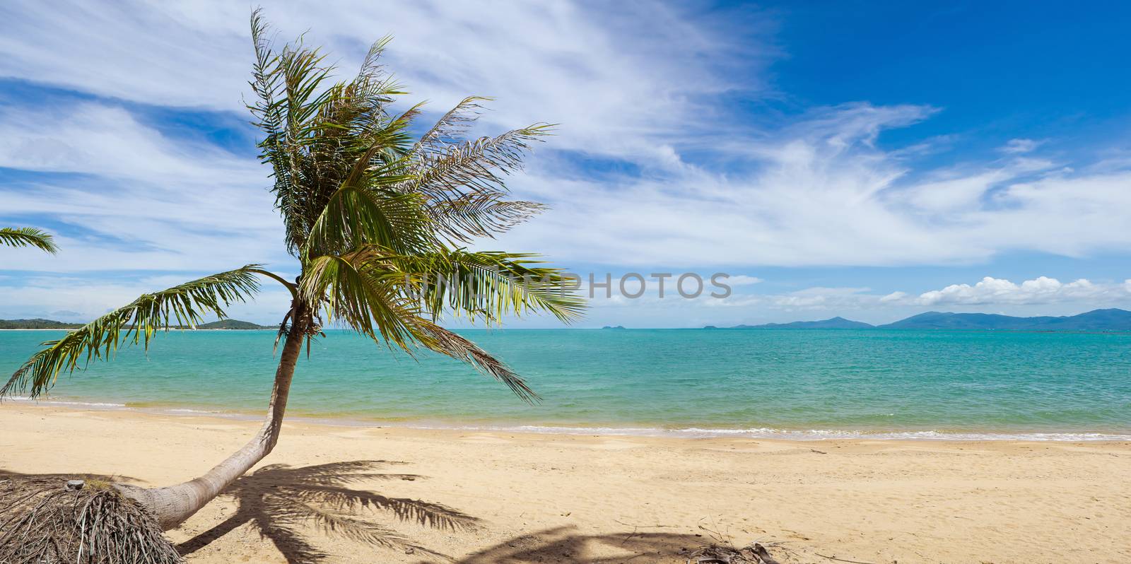 Wide view of tranquil tropical island beach