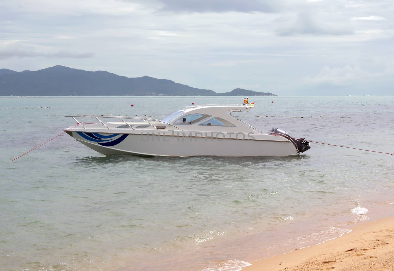 Speedboat anchored near beach in Koh Samui, Thailand.