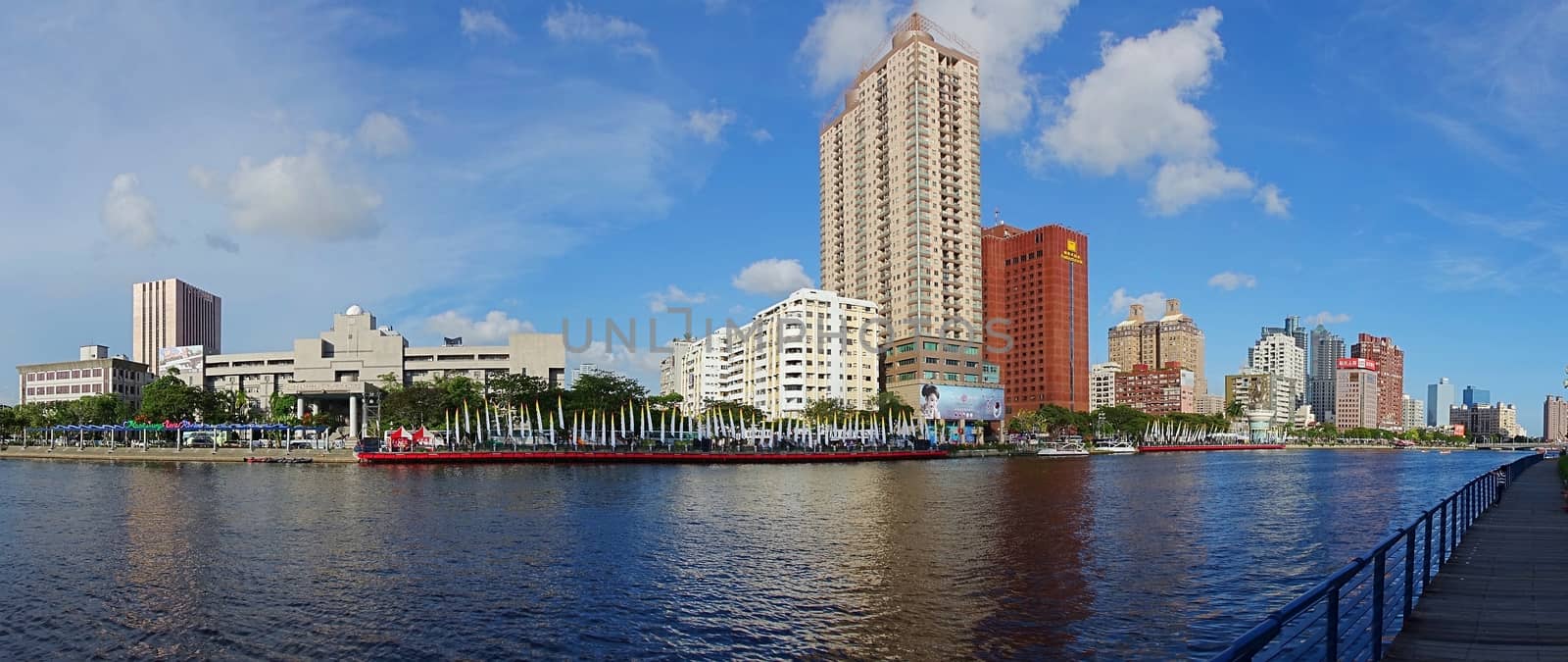 KAOHSIUNG, TAIWAN -- JUNE 14, 2015: A panoramic view of the Love River in downtown Kaohsiung city on a clear summer day.
