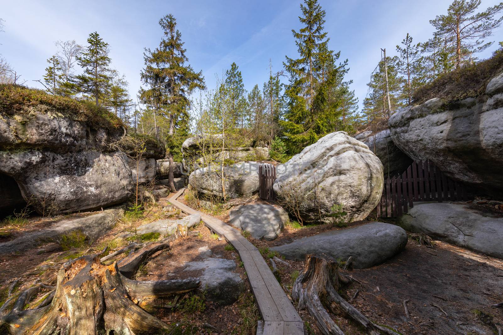 Stolowe Mountains National Park. Wooden boardwalk in Rock Labyrinth hiking trail Bledne Skaly near Kudowa-Zdroj, Lower Silesia, Poland. 