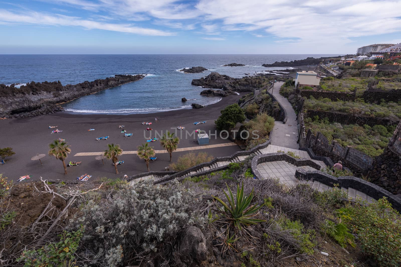 Tropical cactus garden and black sand beach at Los Cancajos. La Palma, Canary Island, Spain.