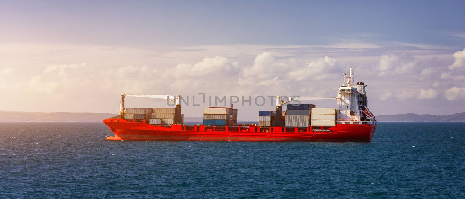 Logistics and transportation of International Container Cargo ship in the sea. International Container Cargo ship in the ocean, Freight Transportation, Shipping, Nautical Vessel.