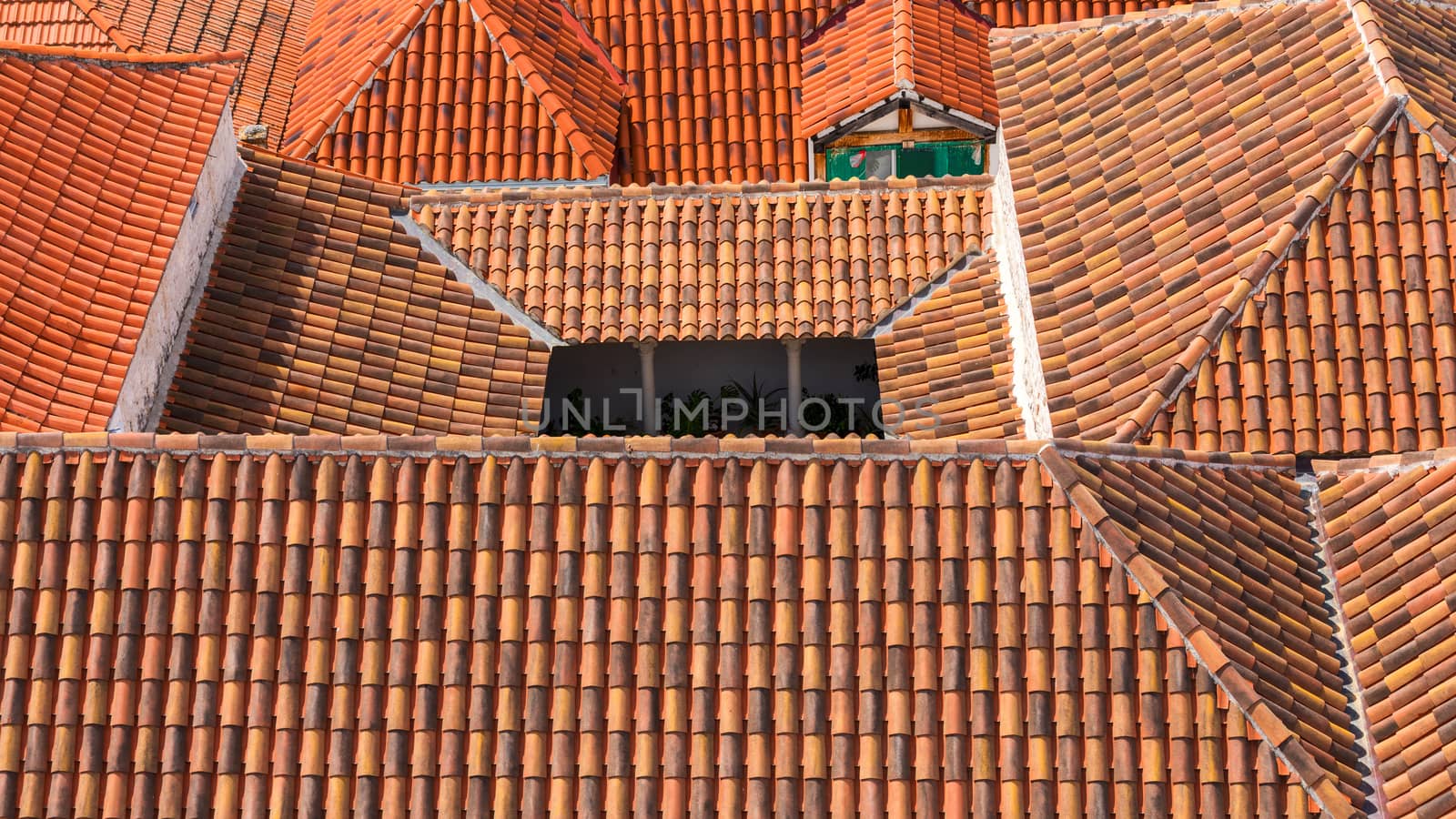 Trogir in Croatia, town panoramic view with red roof tiles, Croatian tourist destination. Trogir town sea front view, Croatia. Roofs of Trogir in Croatia.