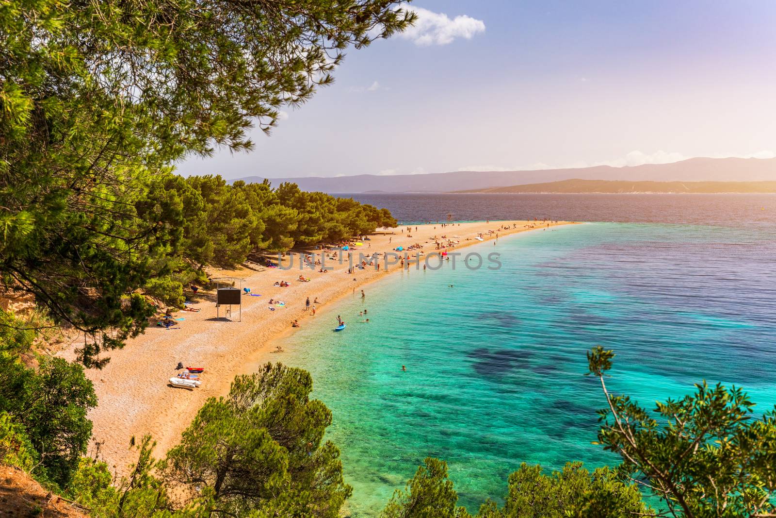 Zlatni Rat (Golden Cape or Golden Horn) famous turquoise beach in Bol town on Brac island, Dalmatia, Croatia. Zlatni Rat sandy beach at Bol on Brac island of Croatia in summertime.
