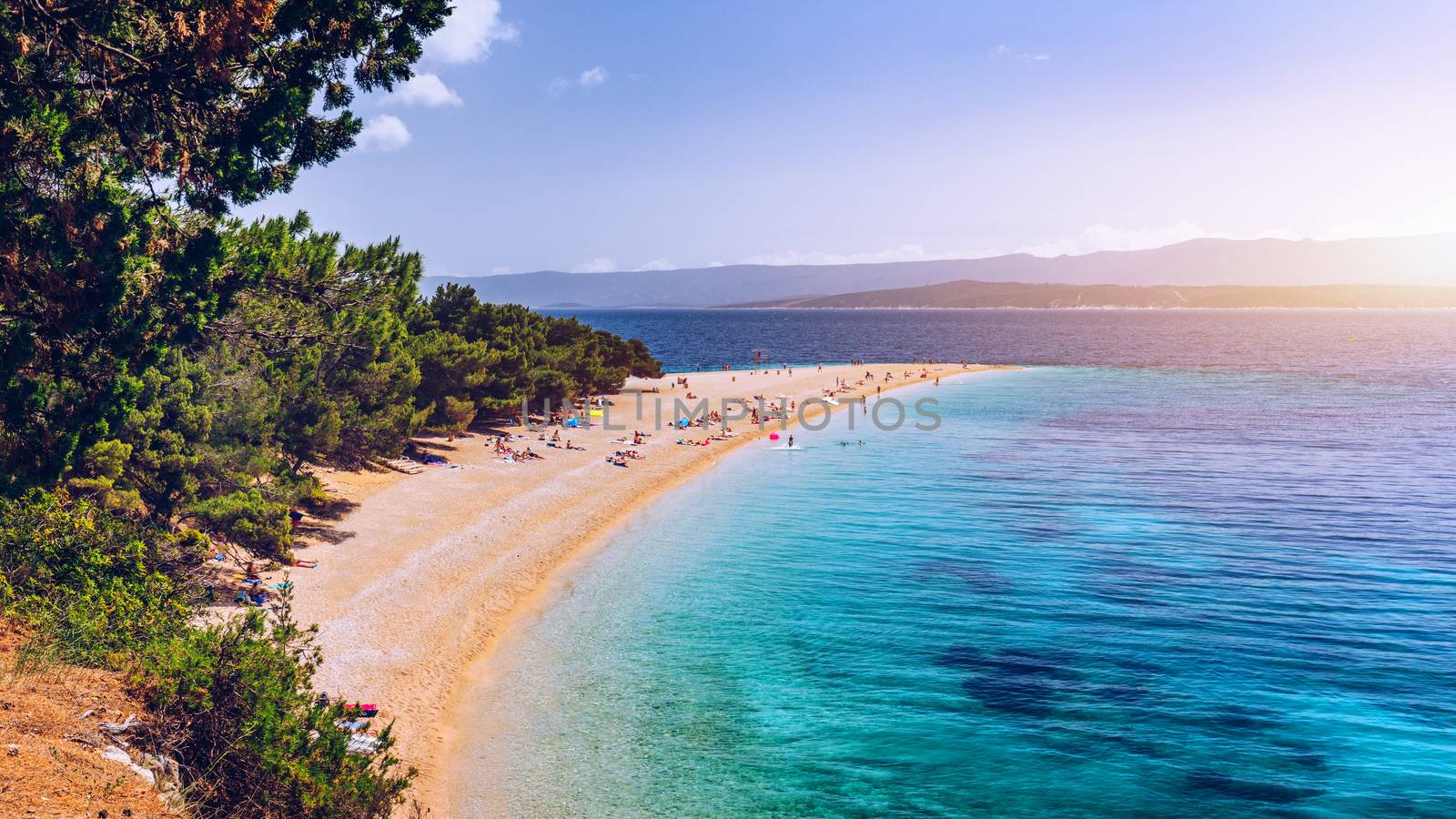 Zlatni Rat (Golden Cape or Golden Horn) famous turquoise beach in Bol town on Brac island, Dalmatia, Croatia. Zlatni Rat sandy beach at Bol on Brac island of Croatia in summertime.