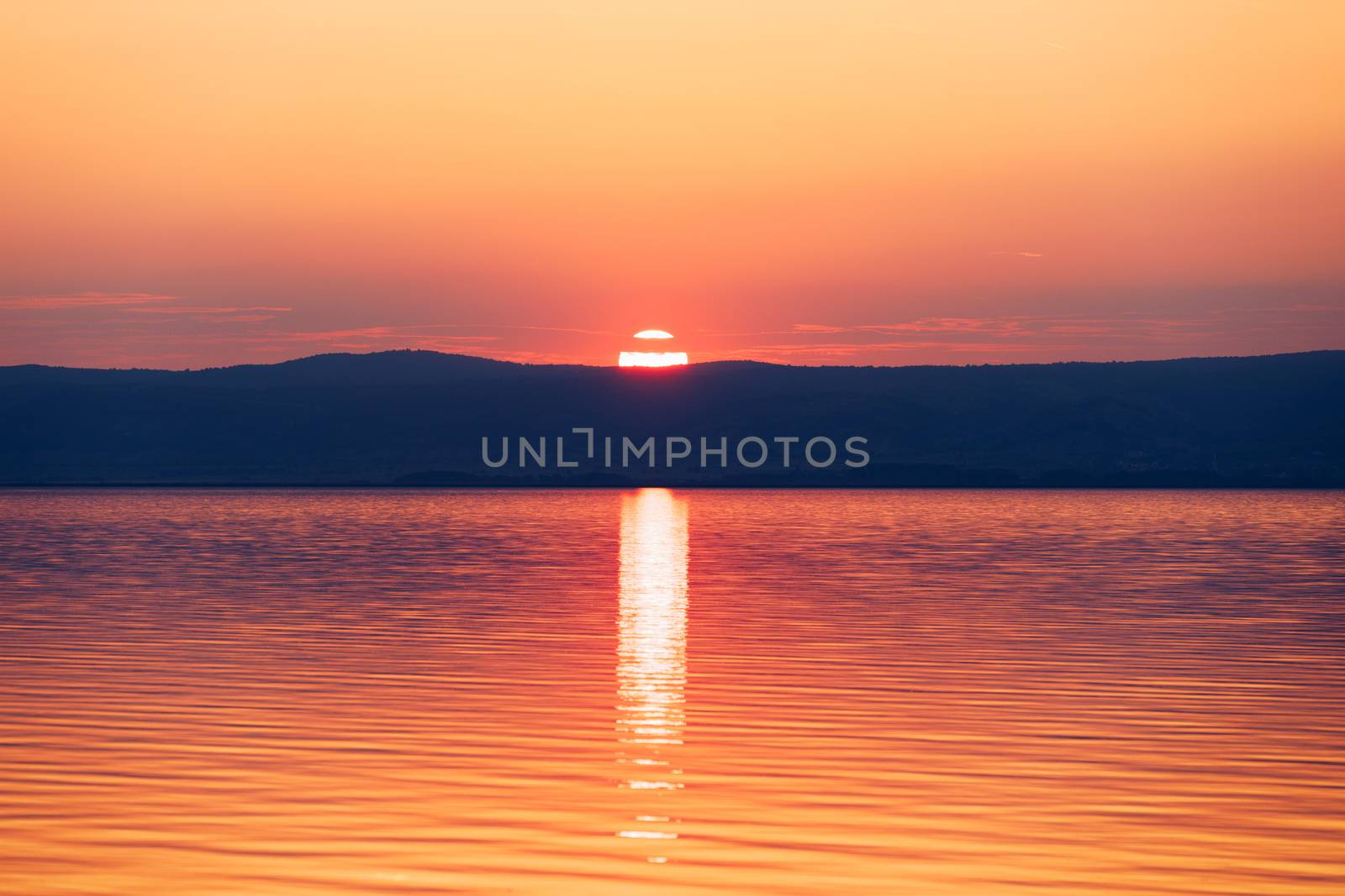 Beautiful sunset or sunrise above the sea. Tropical sunset or sunrise over sea. Colourful sunset or sunrise over water.