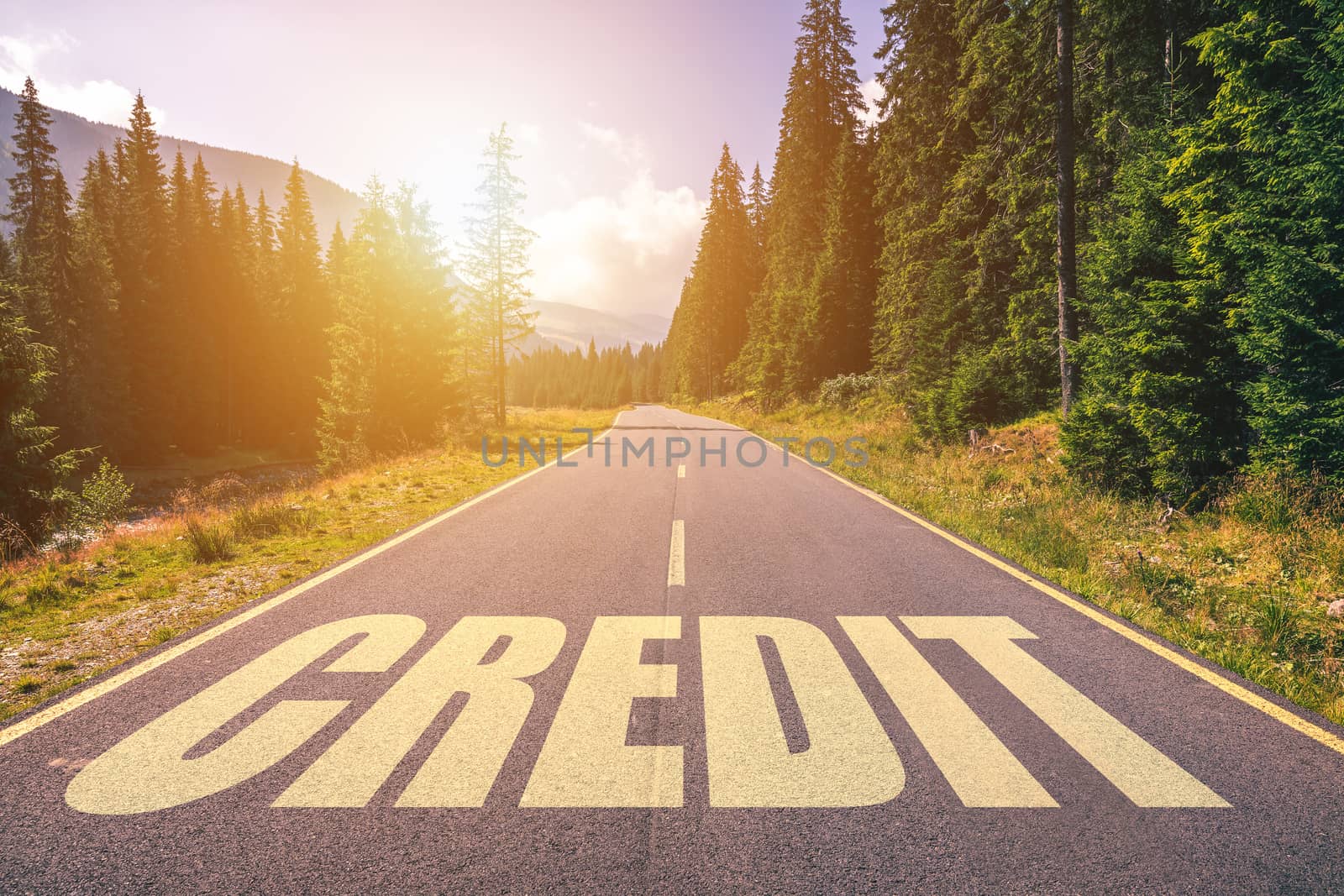 Credit word written on road in the mountains