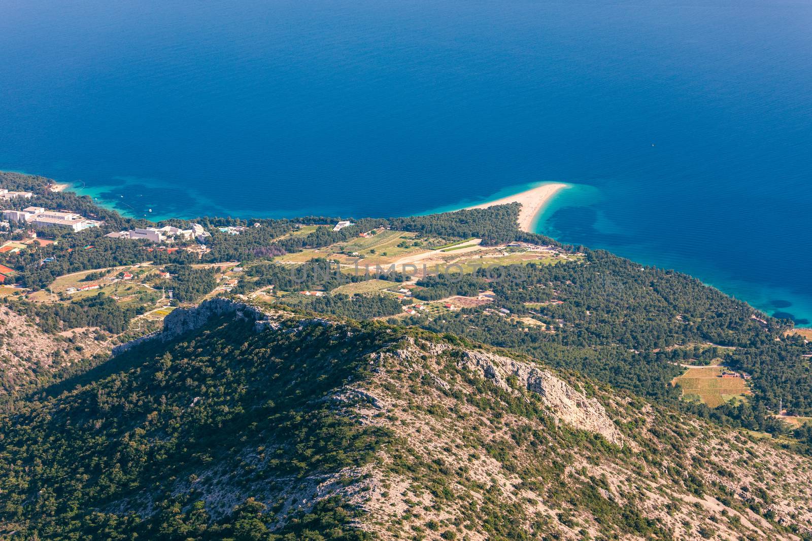 Beautiful panorama of famous Adriatic beach Zlatni Rat (Golden Cape or Golden Horn) with turquoise water , Island of Brac Croatia summertime. Famous Adriatic beach Zlatni Rat in Bol, Brac, Croatia.