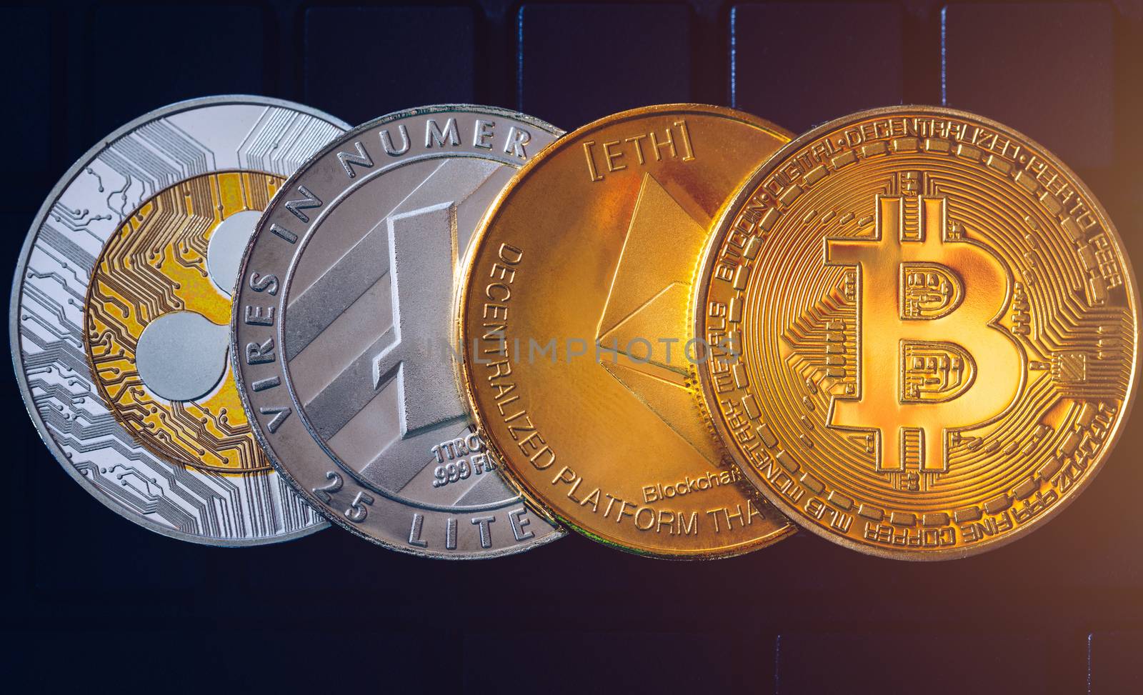 Set of cryptocurrencies with Bitcoin, Etherium, Ripple, Litecoin. Cryptocurrencys new digital money. Bitcoin on the front as the leader. Bitcoin as most important cryptocurrency.