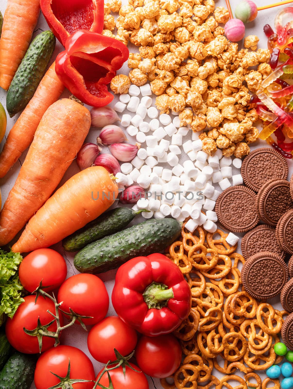 Healthy or unhealthy food concept. Fruits and vegetables vs sweets top view flat lay