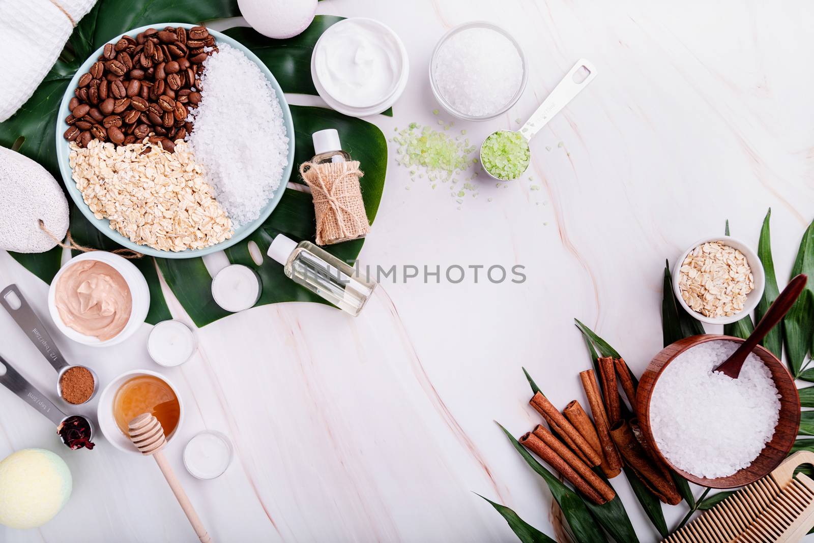 Natural cosmetics concepts. Beautiful spa setting with palm leaf. Body care cosmetic products top view flat lay