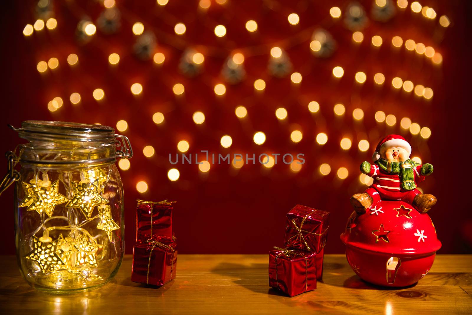 Christmas fairy lights in a mason jar, glowing in the dark, fairy lights in mason jar with selective focus, glitter overlay 