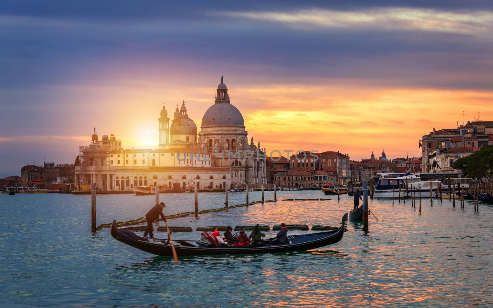 Canal with gondolas in Venice, Italy. Architecture and landmarks of Venice. Venice postcard with Venice gondolas.