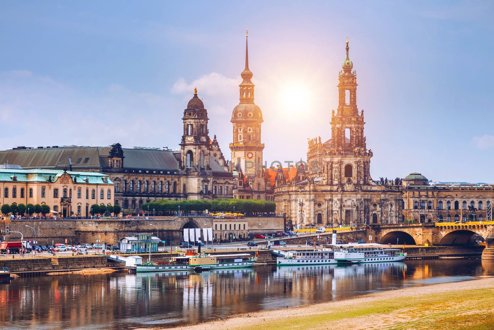 Incredible evening panorama of Cathedral of the Holy Trinity or Hofkirche, Bruehl's Terrace or The Balcony of Europe. Dramatic autumn sunset on Elbe river in Dresden, Saxony, Germany, Europe.