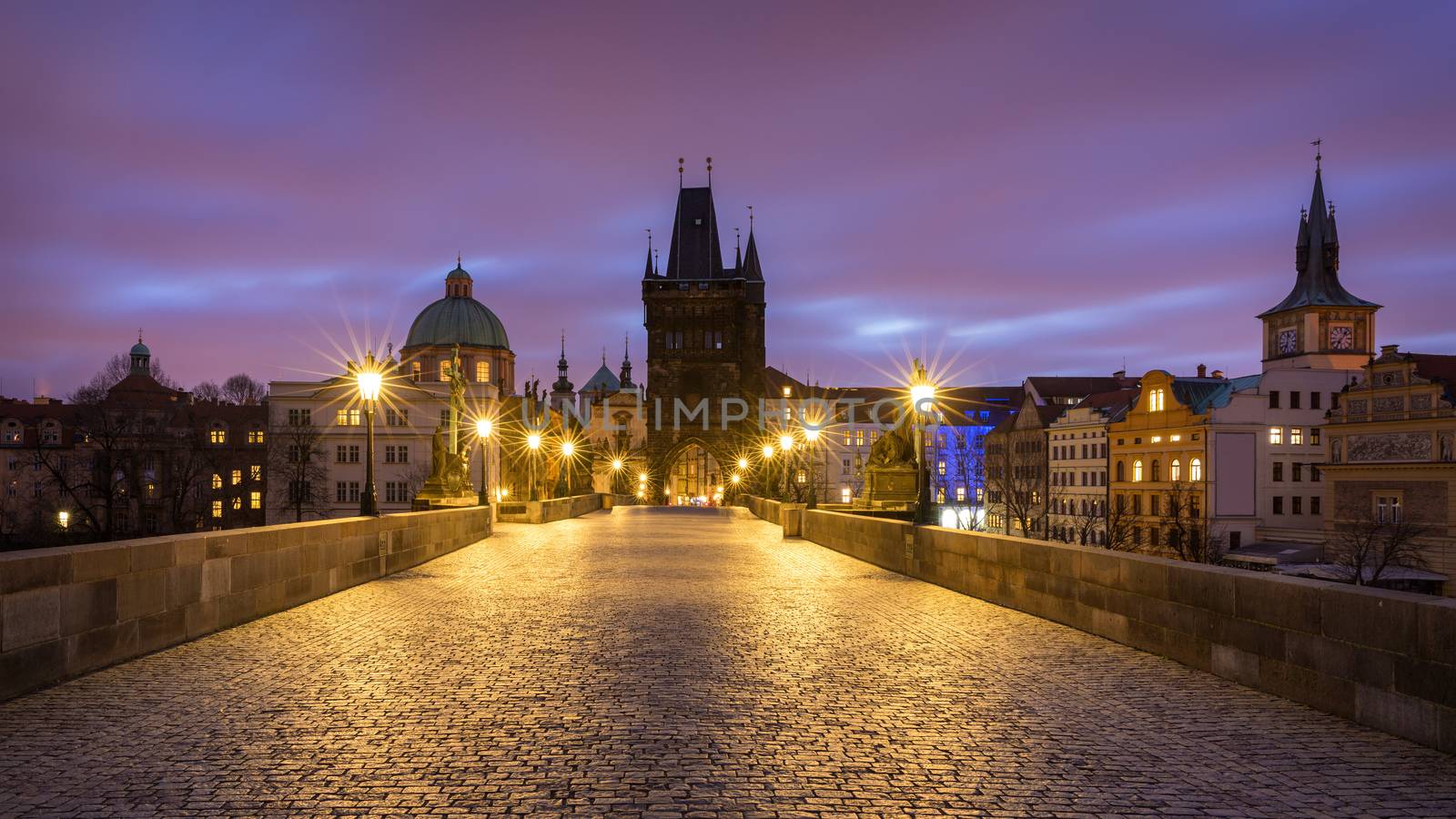 Morning view of Charles Bridge in Prague, Czech Republic. The Charles Bridge is one of the most visited sights in Prague. Architecture and landmark of Prague