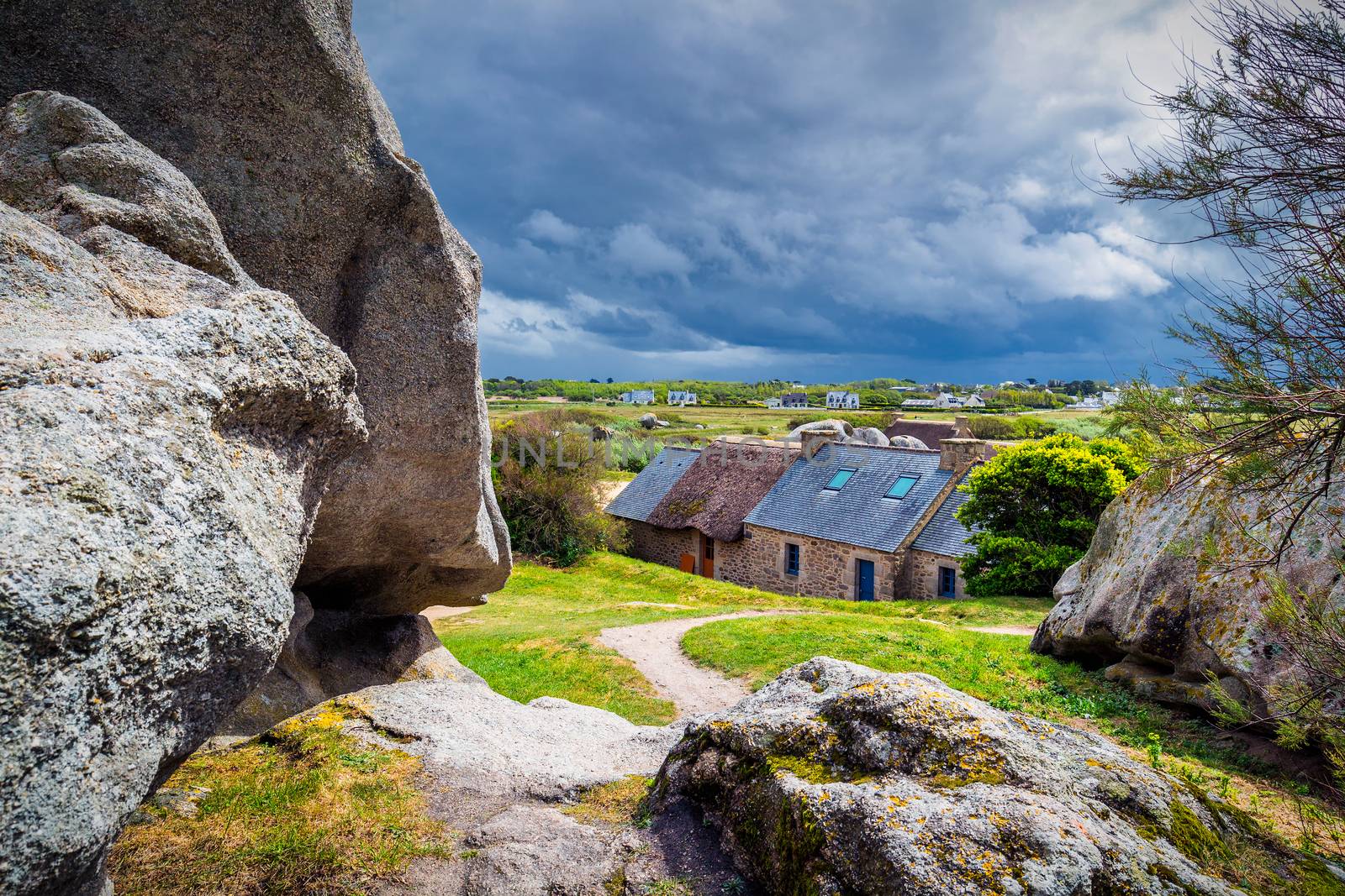House between the rocks in Meneham village, Kerlouan, Finistere, Brittany (Bretagne), France