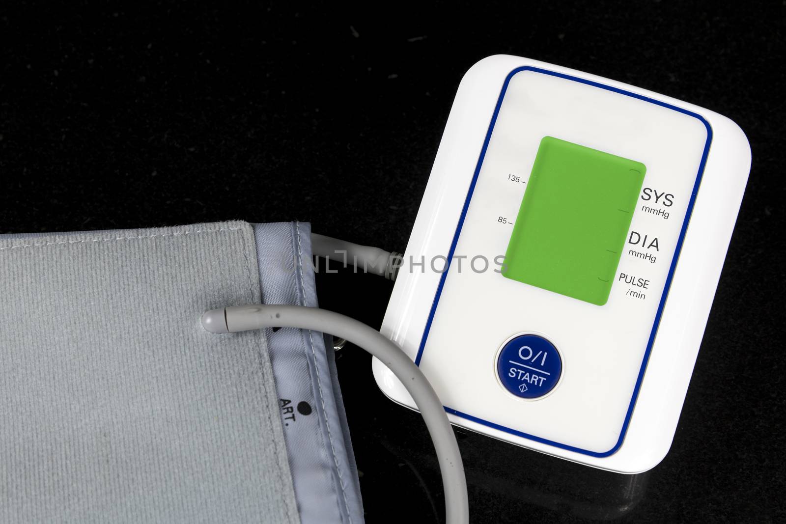 Automatic Blood Pressure Monitor with green screen on black background