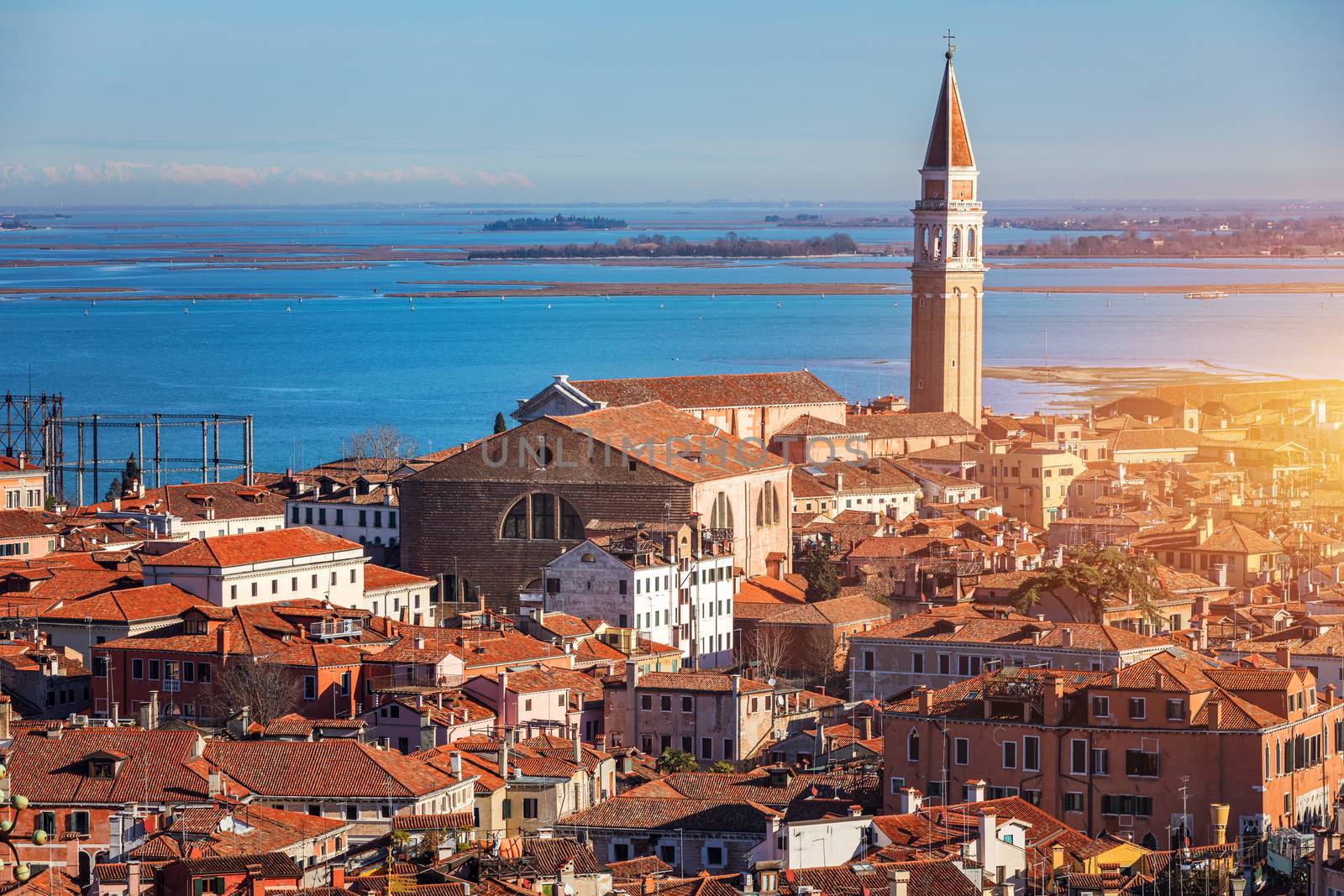 Venice panoramic aerial view with red roofs, Veneto, Italy. Aerial view with dense medieval red roofs of Venice, Italy 