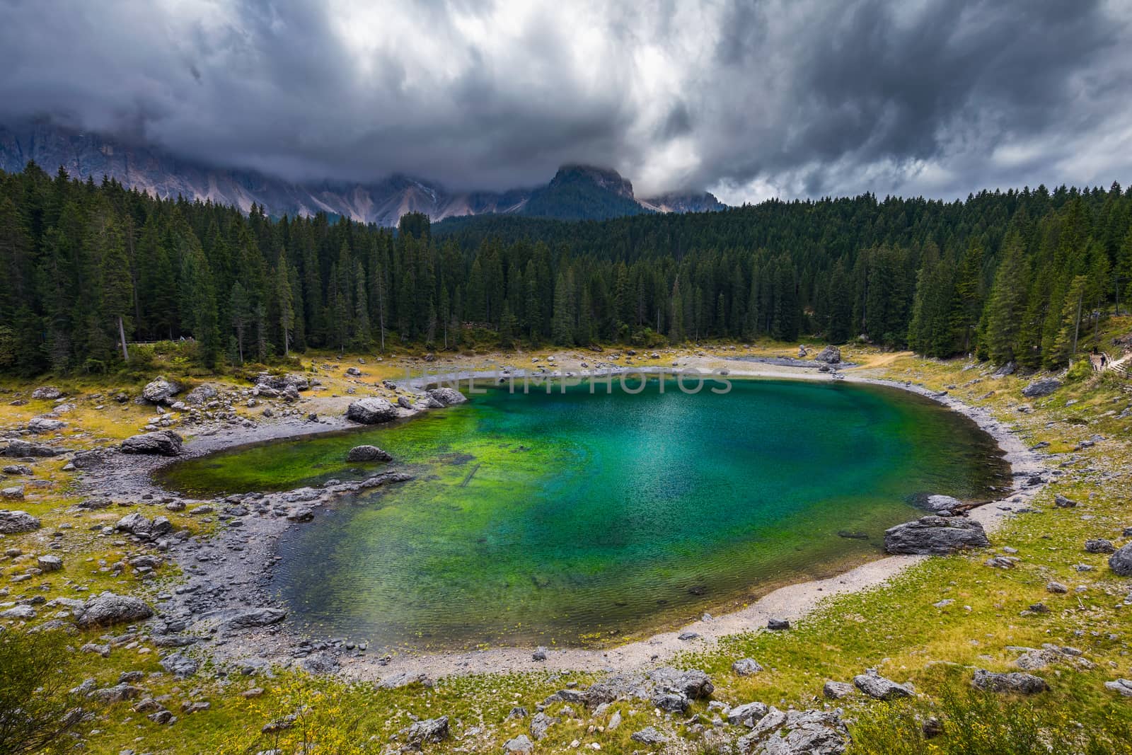 Carezza lake (Lago di Carezza, Karersee) with Mount Latemar, Bolzano province, South tyrol, Italy.