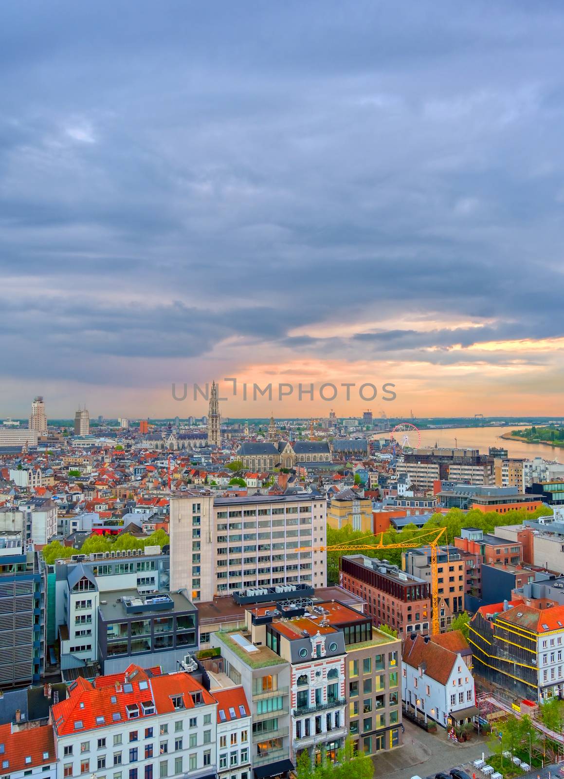 An aerial view of Antwerp, Belgium at sunset.