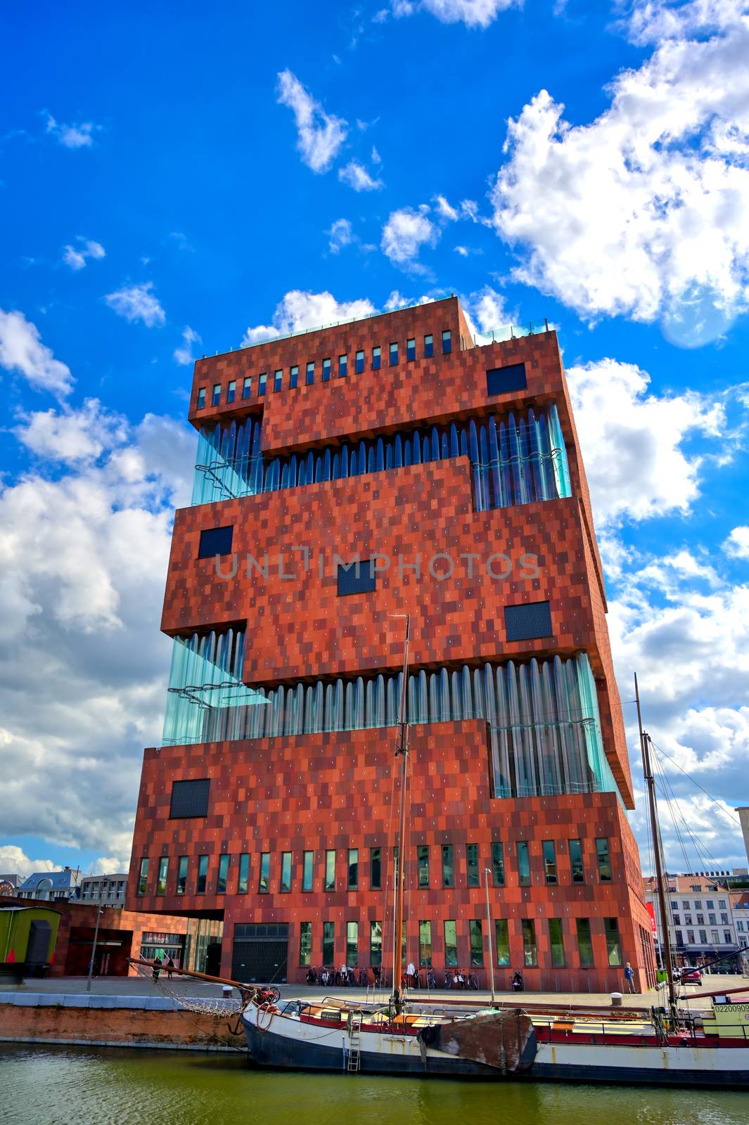 Antwerp, Belgium - April 26, 2019: Museum aan de Stroom (MAS) along the river Scheldt and the Port of Antwerp in Antwerp, Belgium.