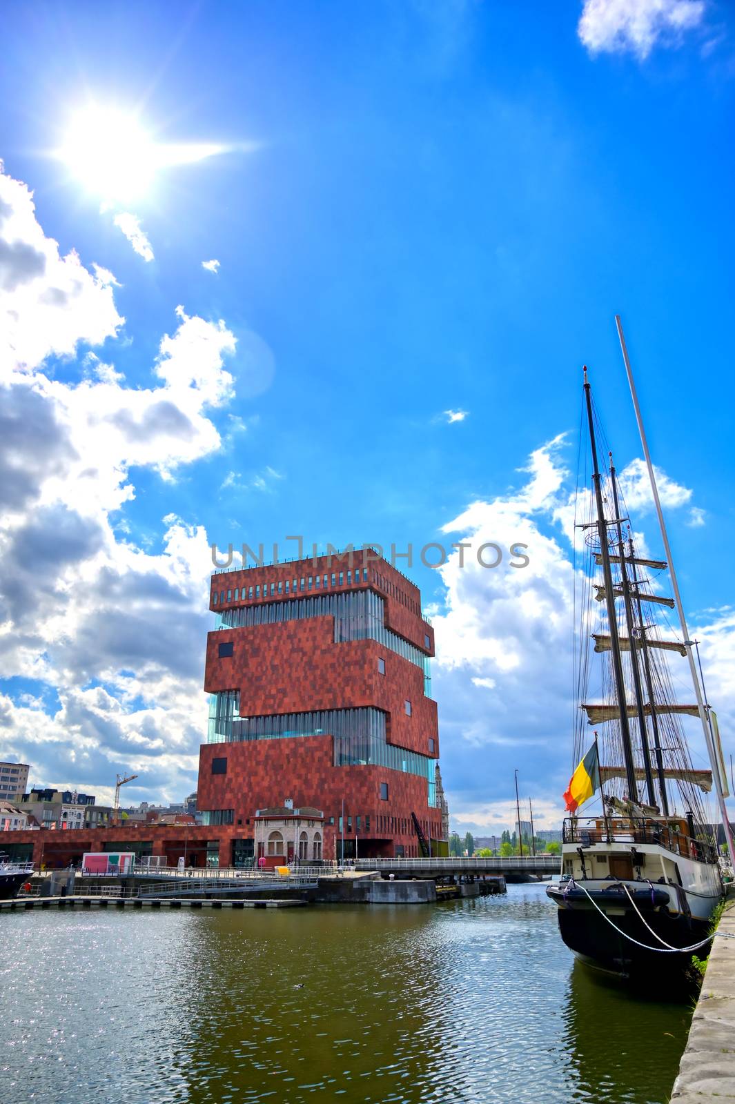 Antwerp, Belgium - April 26, 2019: Museum aan de Stroom (MAS) along the river Scheldt and the Port of Antwerp in Antwerp, Belgium.