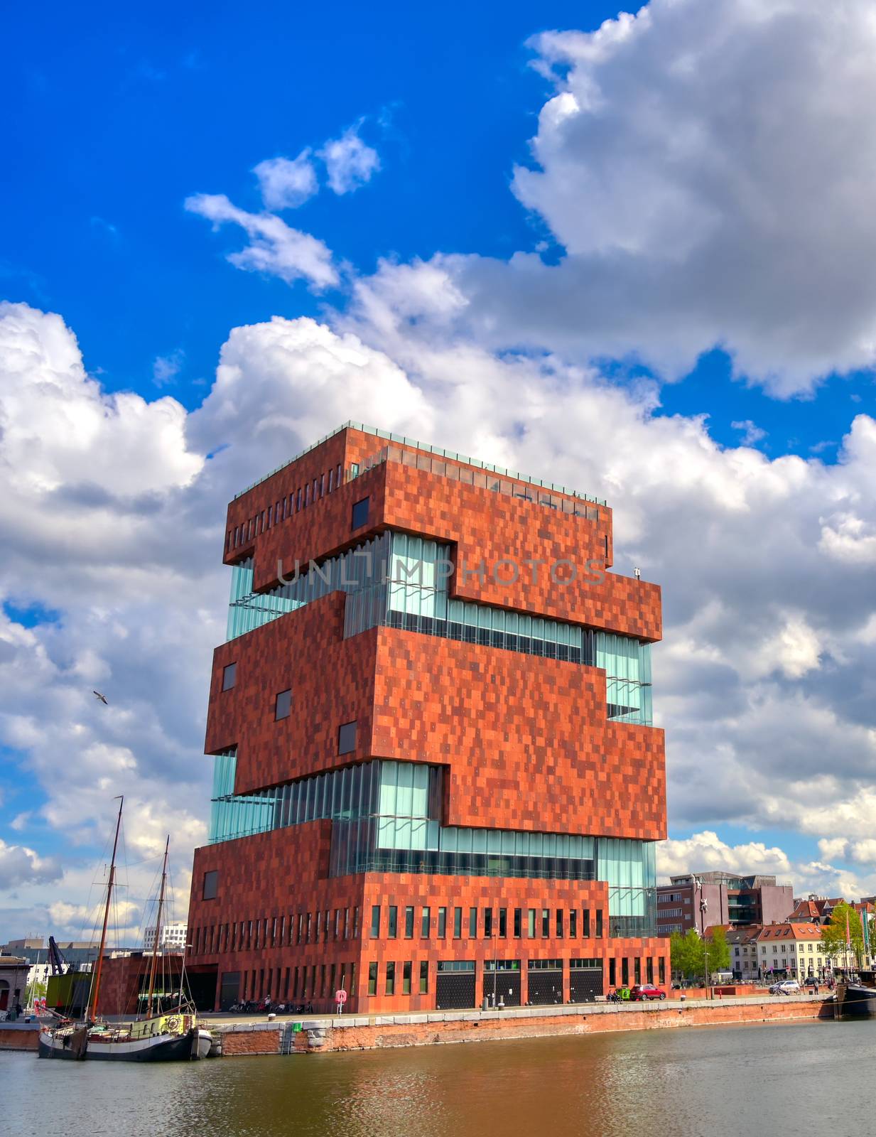 Antwerp, Belgium - April 26, 2019: Museum aan de Stroom (MAS) along the river Scheldt and the Port of Antwerp in Antwerp, Belgium.