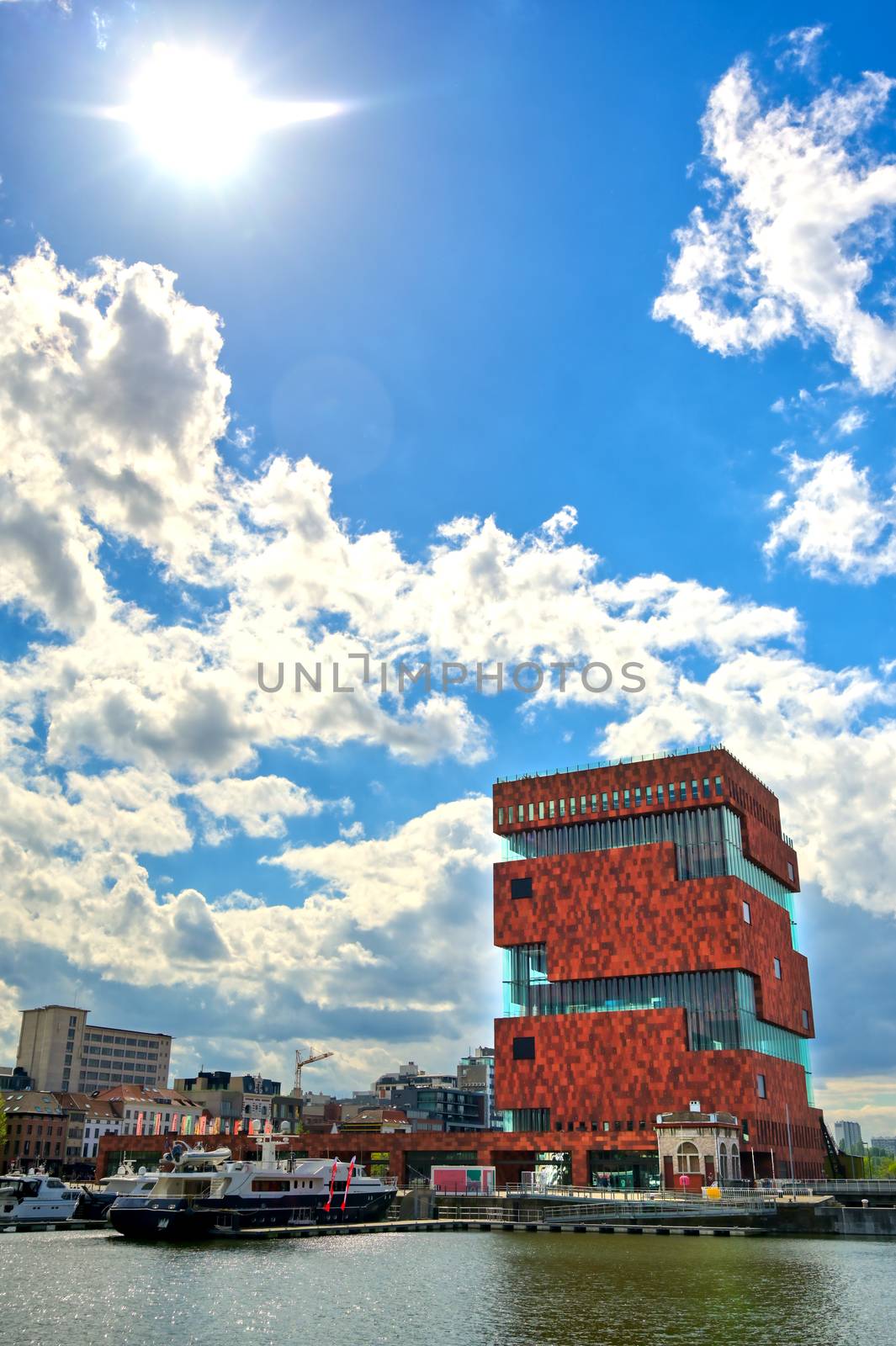 Antwerp, Belgium - April 26, 2019: Museum aan de Stroom (MAS) along the river Scheldt and the Port of Antwerp in Antwerp, Belgium.