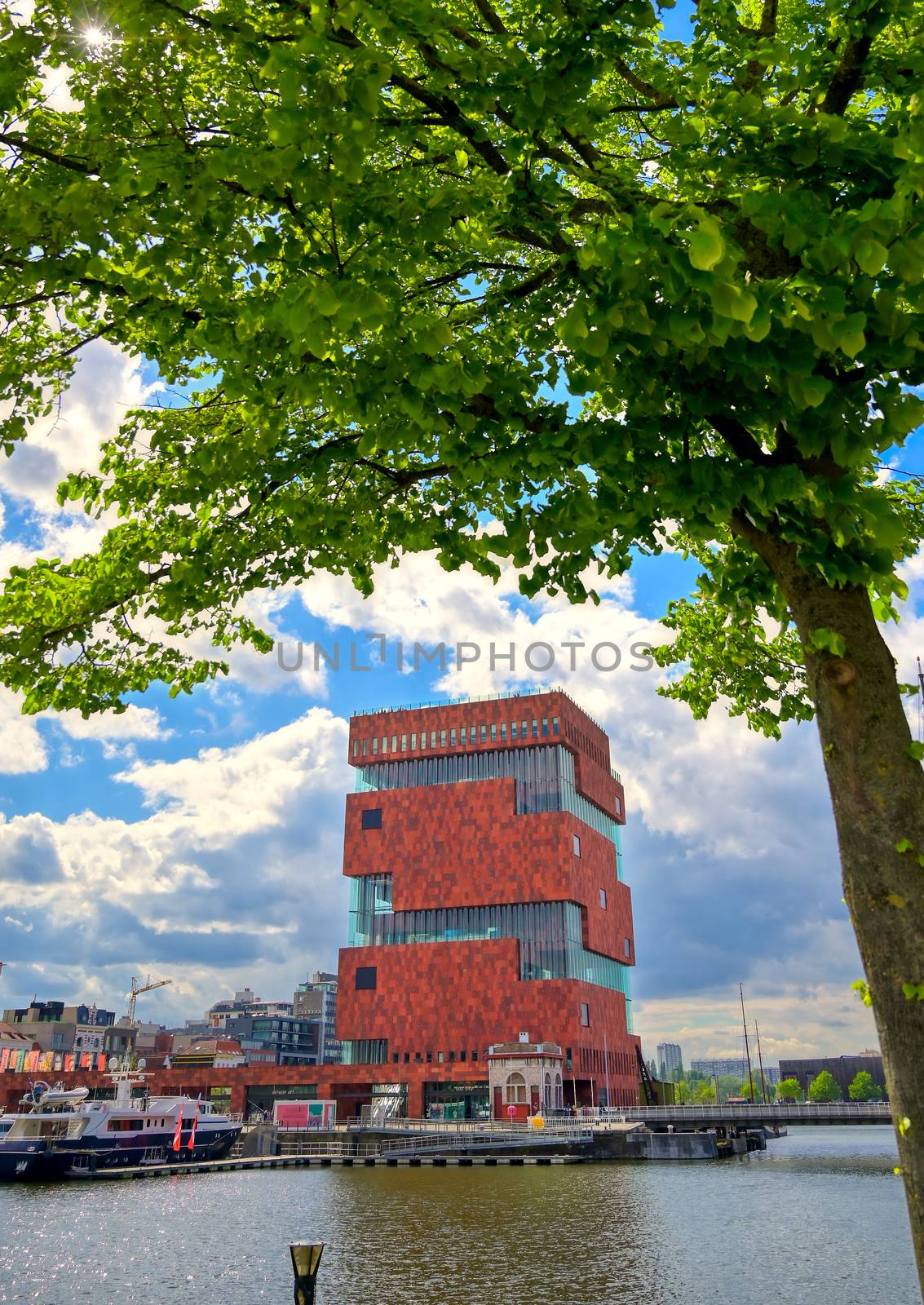 Antwerp, Belgium - April 26, 2019: Museum aan de Stroom (MAS) along the river Scheldt and the Port of Antwerp in Antwerp, Belgium.