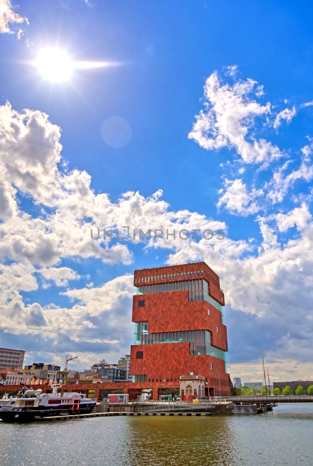 Antwerp, Belgium - April 26, 2019: Museum aan de Stroom (MAS) along the river Scheldt and the Port of Antwerp in Antwerp, Belgium.