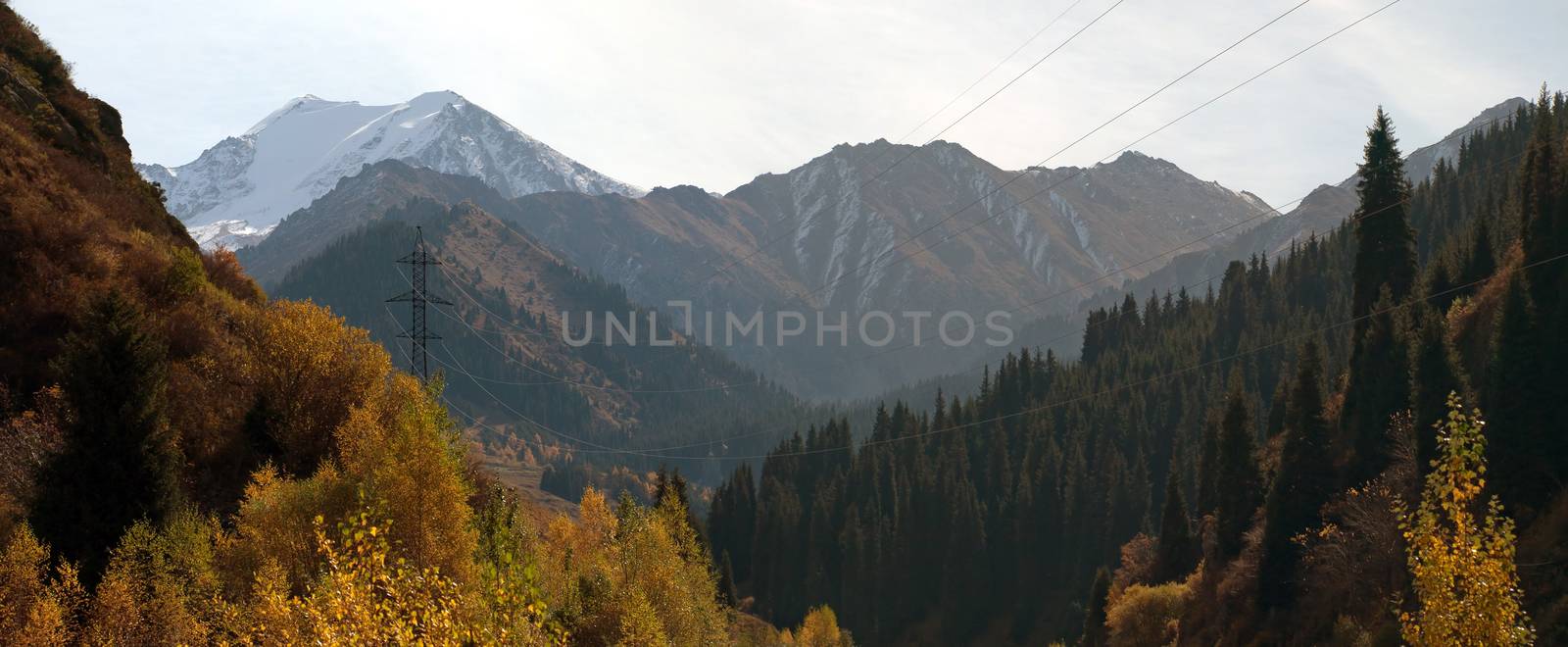 High-voltage power line through Alps mountains