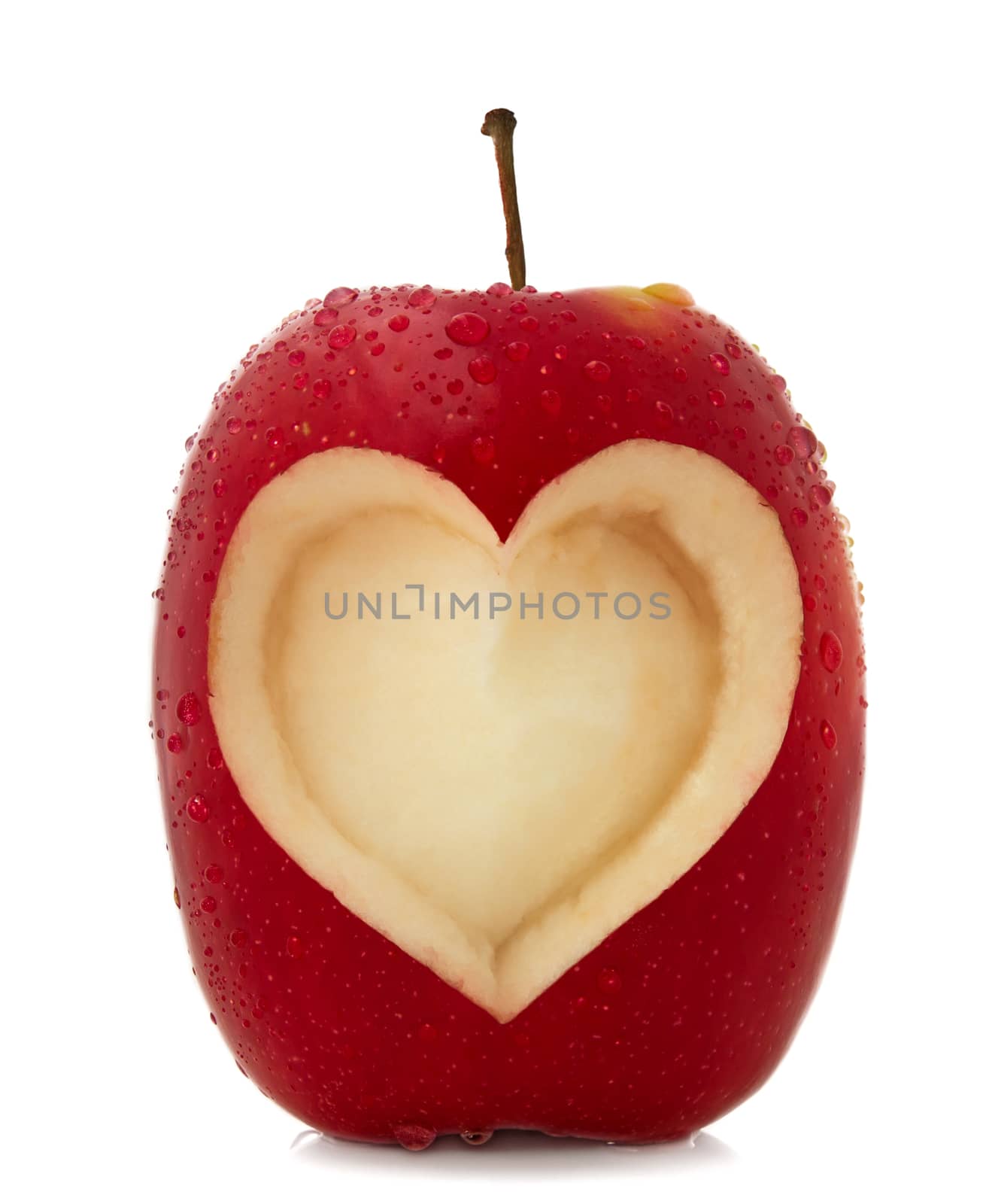 Red apple with a heart symbol isolated on white background