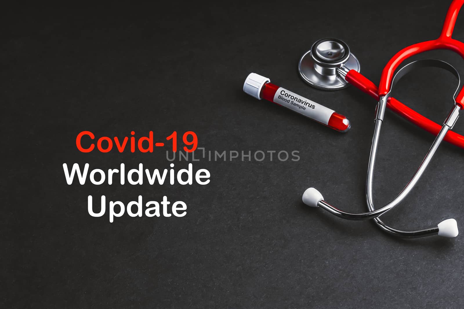 COVID-19 WORLDWIDE UPDATE  text with stethoscope and blood sample vacuum tube on black background by silverwings