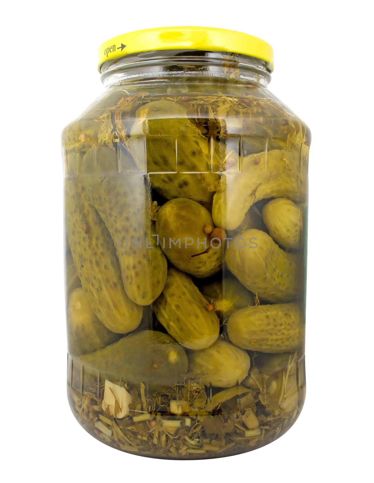 Marinated cucumbers in a glass jar isolated on white. Clipping path included.