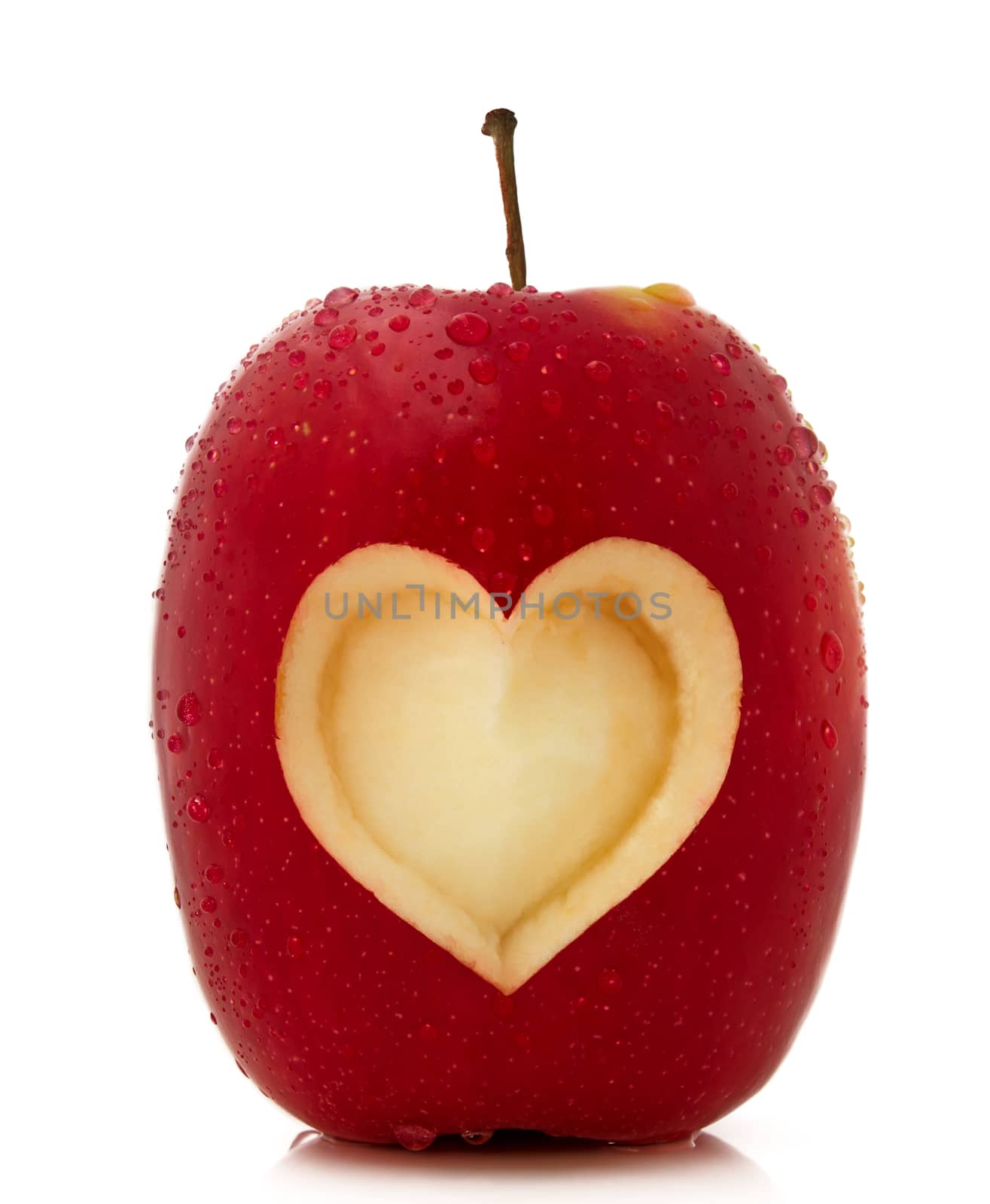 Red apple with a heart symbol isolated on white background
