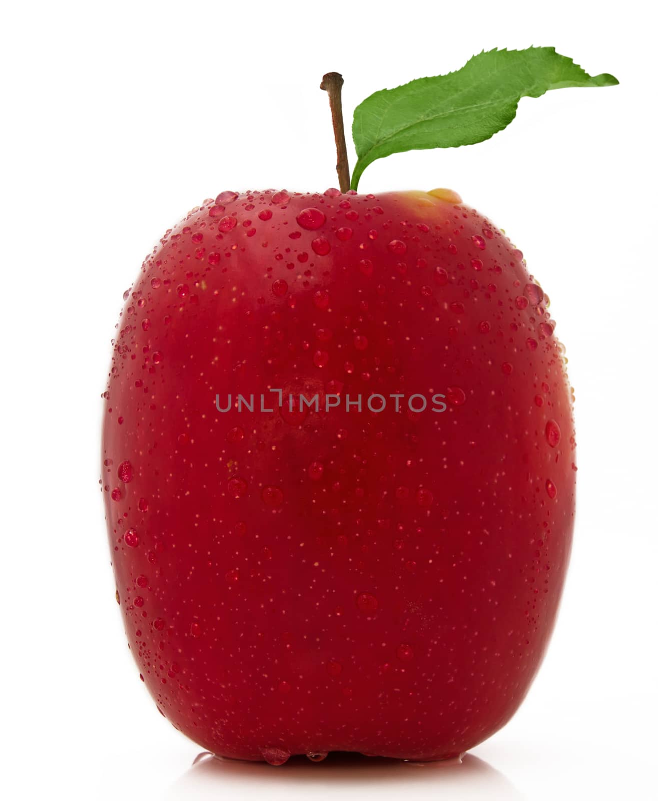 Red apple with drops isolated on white background