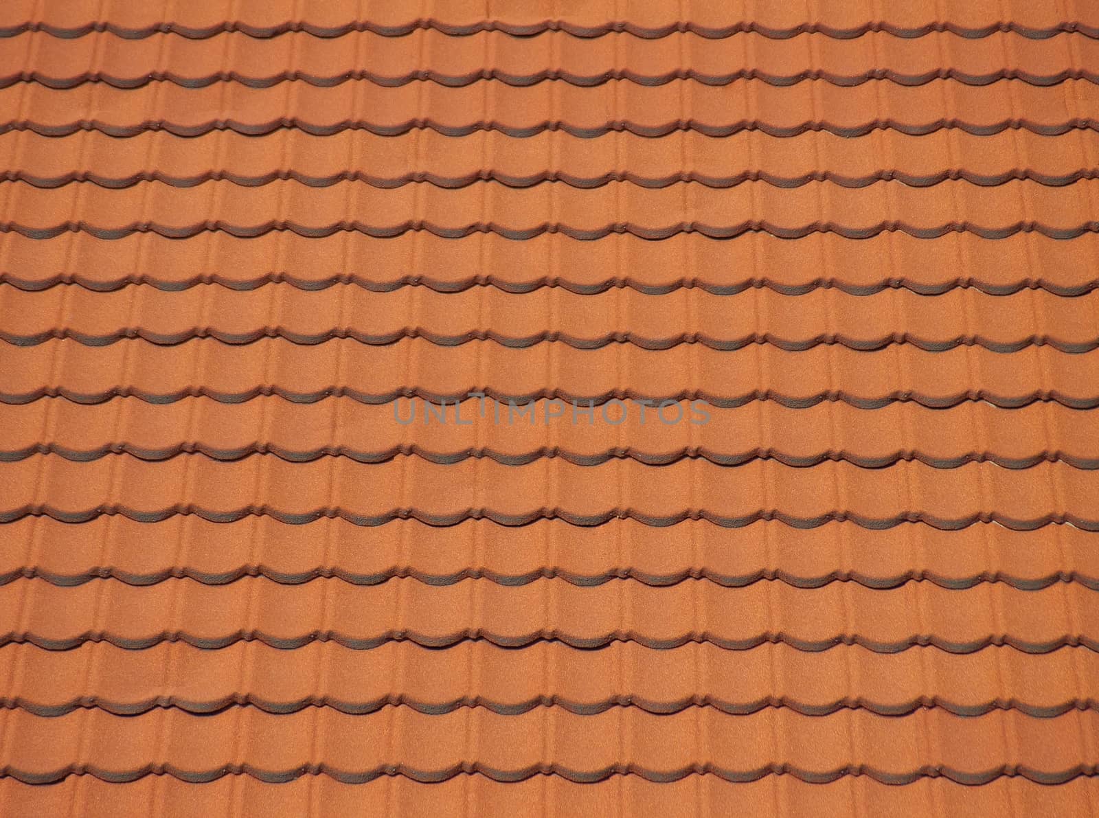 Red clean roof tiles background texture in regular rows.