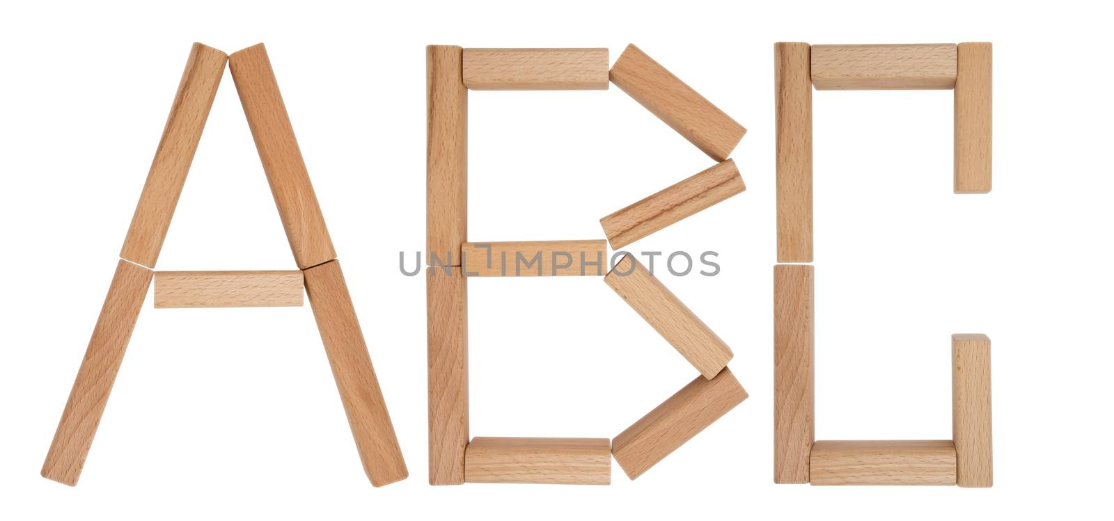 Alphabet letters of wooden toy blocks isolated on white background. Clipping path included.