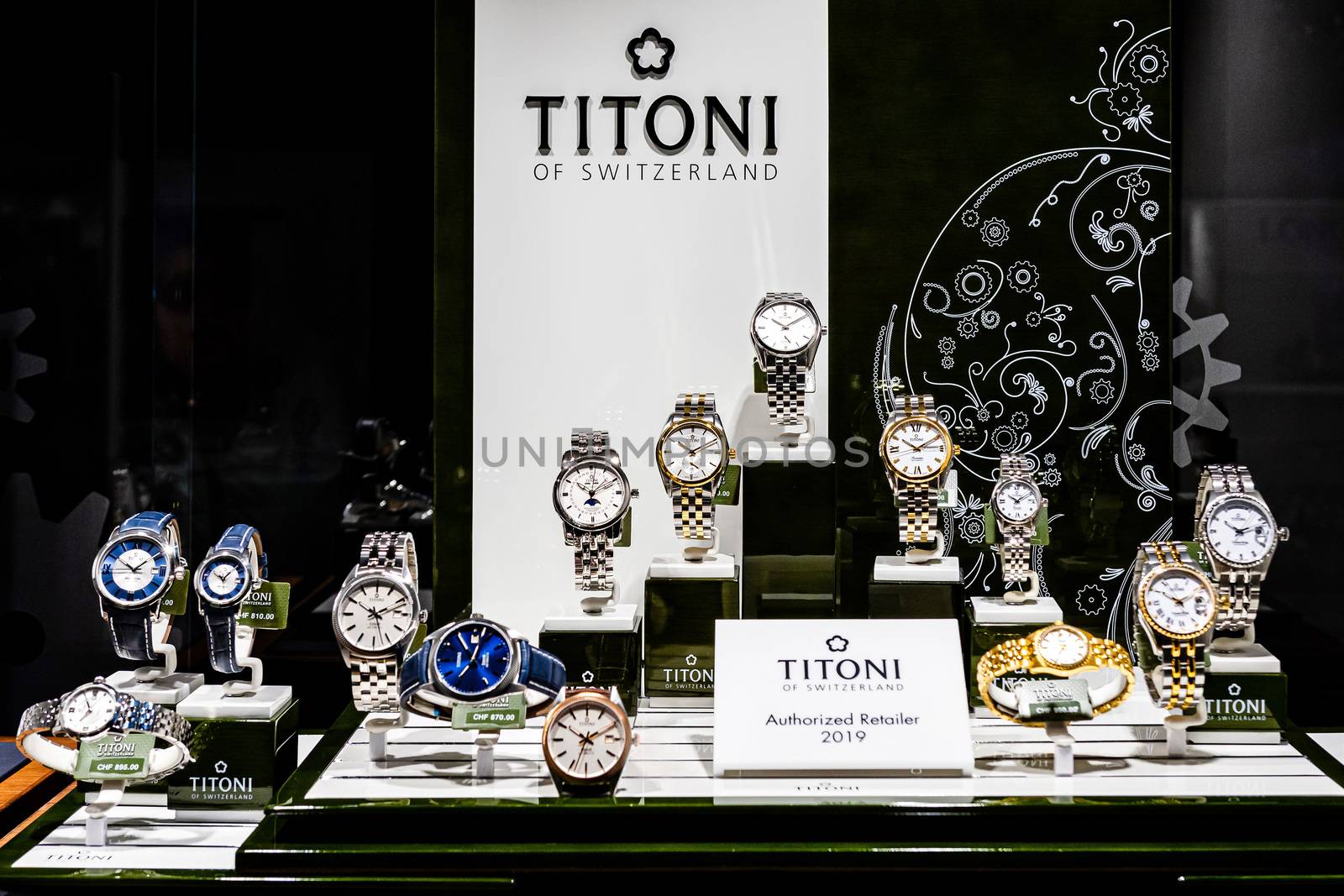 Geneva, Switzerland - April 14, 2019:  Titoni brand watches. Titoni luxury watches at showcase for sale