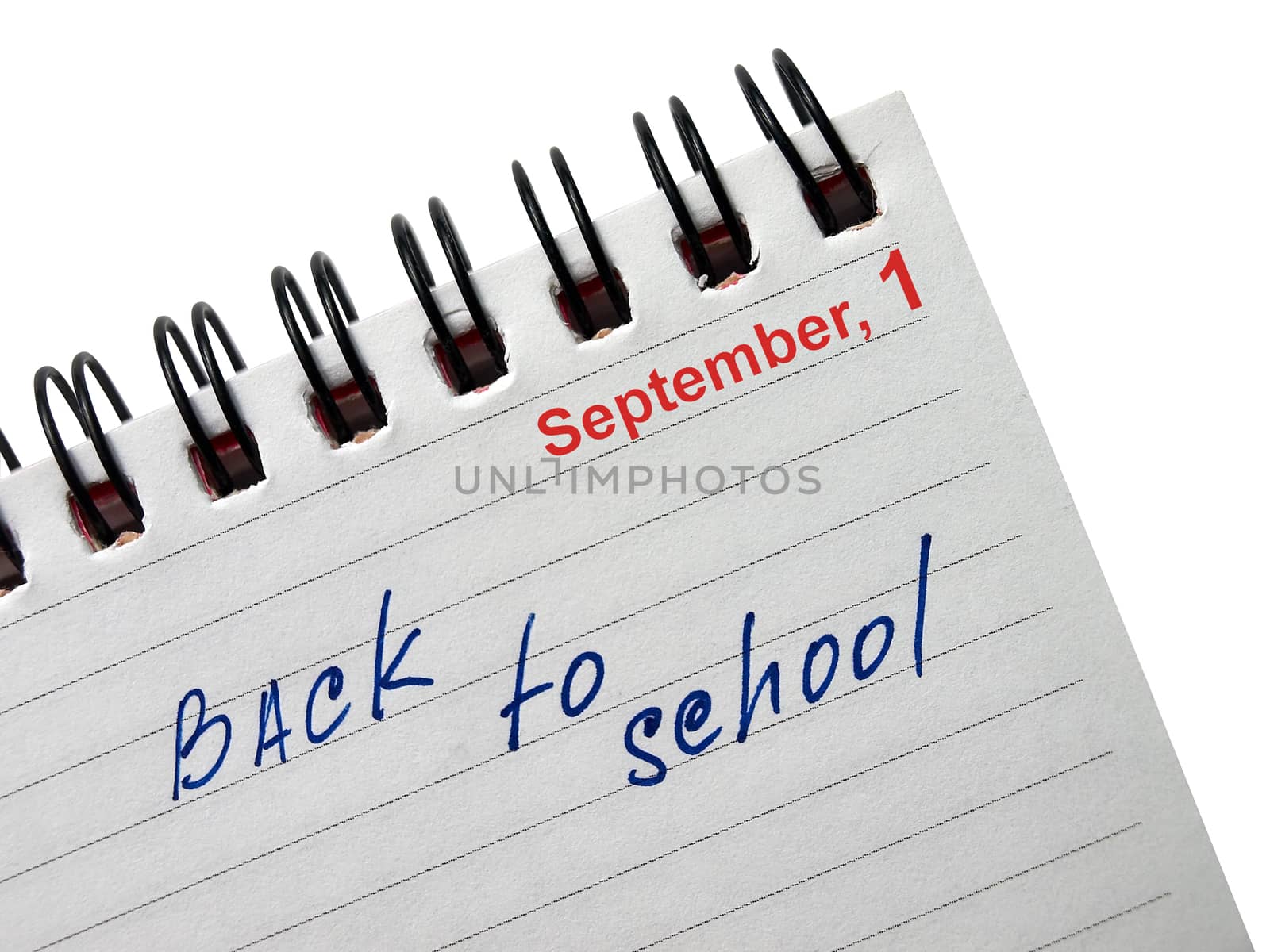 Back to school text on a notebook. Clipping path.