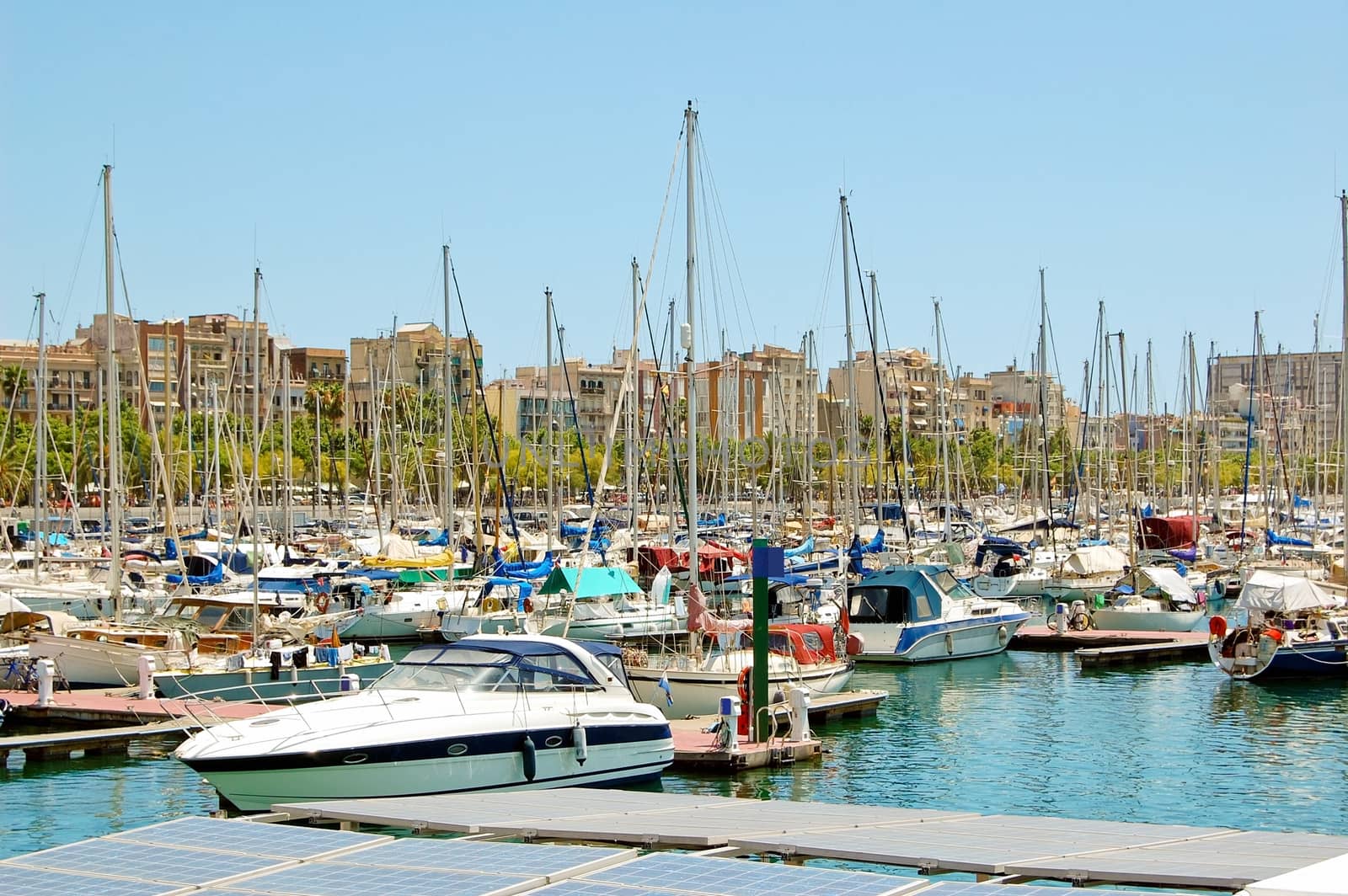 Boats docked in Port Vell marina in Barcelona