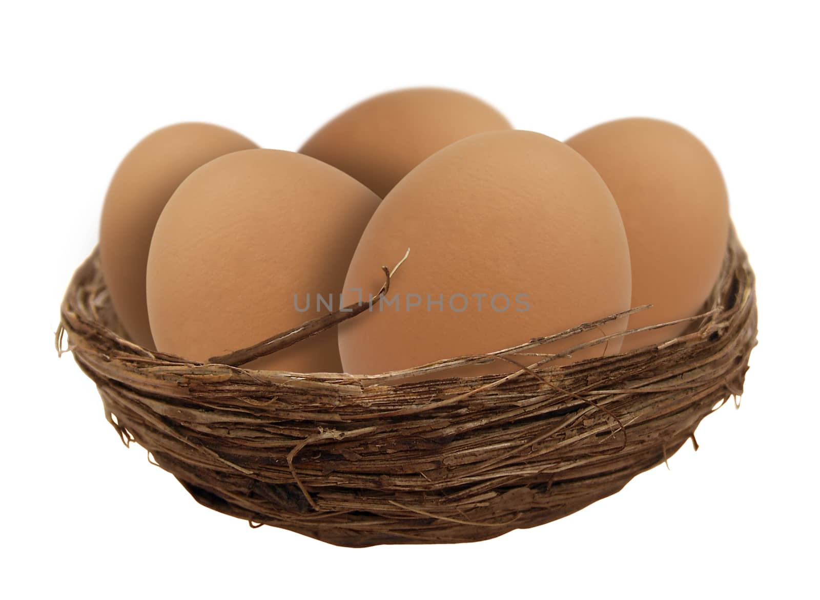 Eggs in a nest isolated on white background