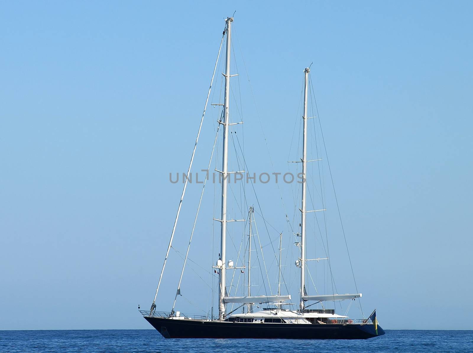 Black Sailboat in Gulf of Saint-Tropez, French Riviera, France