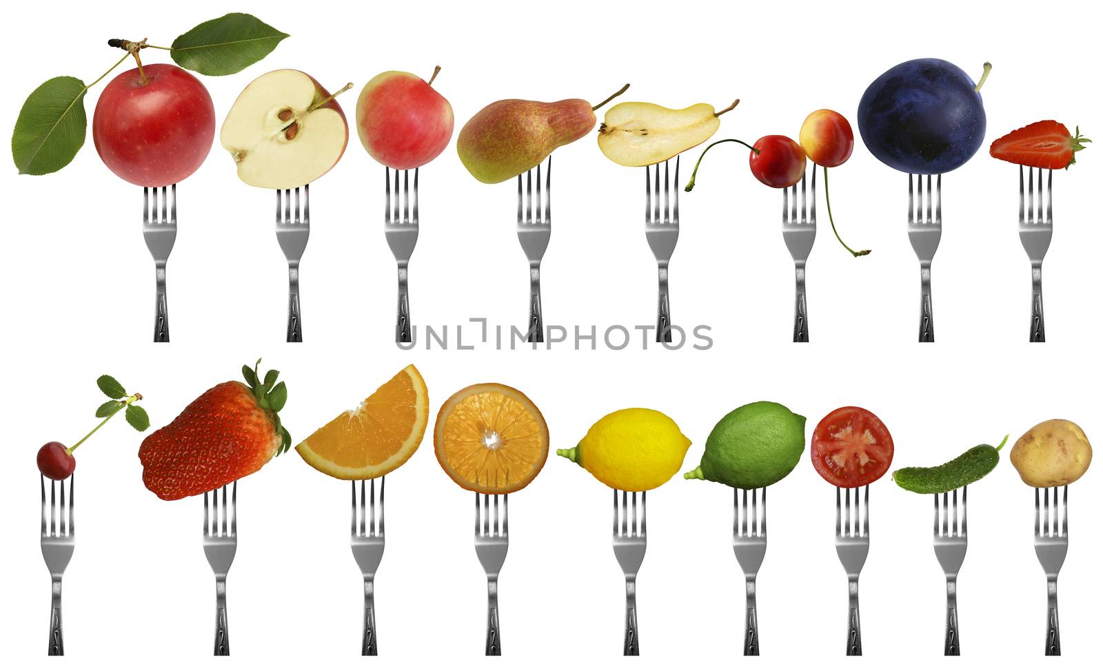 Fruits and vegetables on forks isolated on a white background.