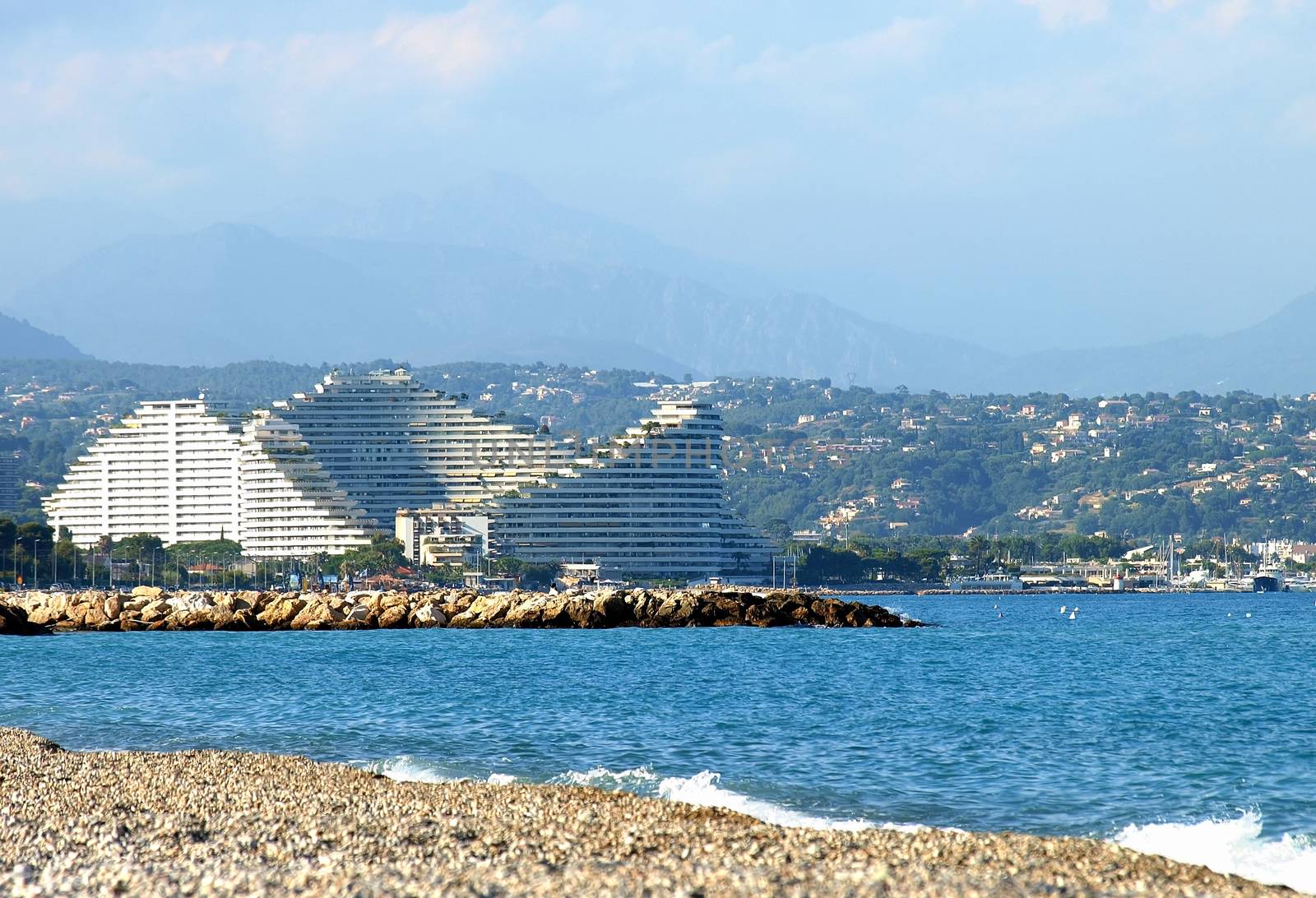 French Riviera Coast. Beach of Antibes. View to front luxury hotel.
