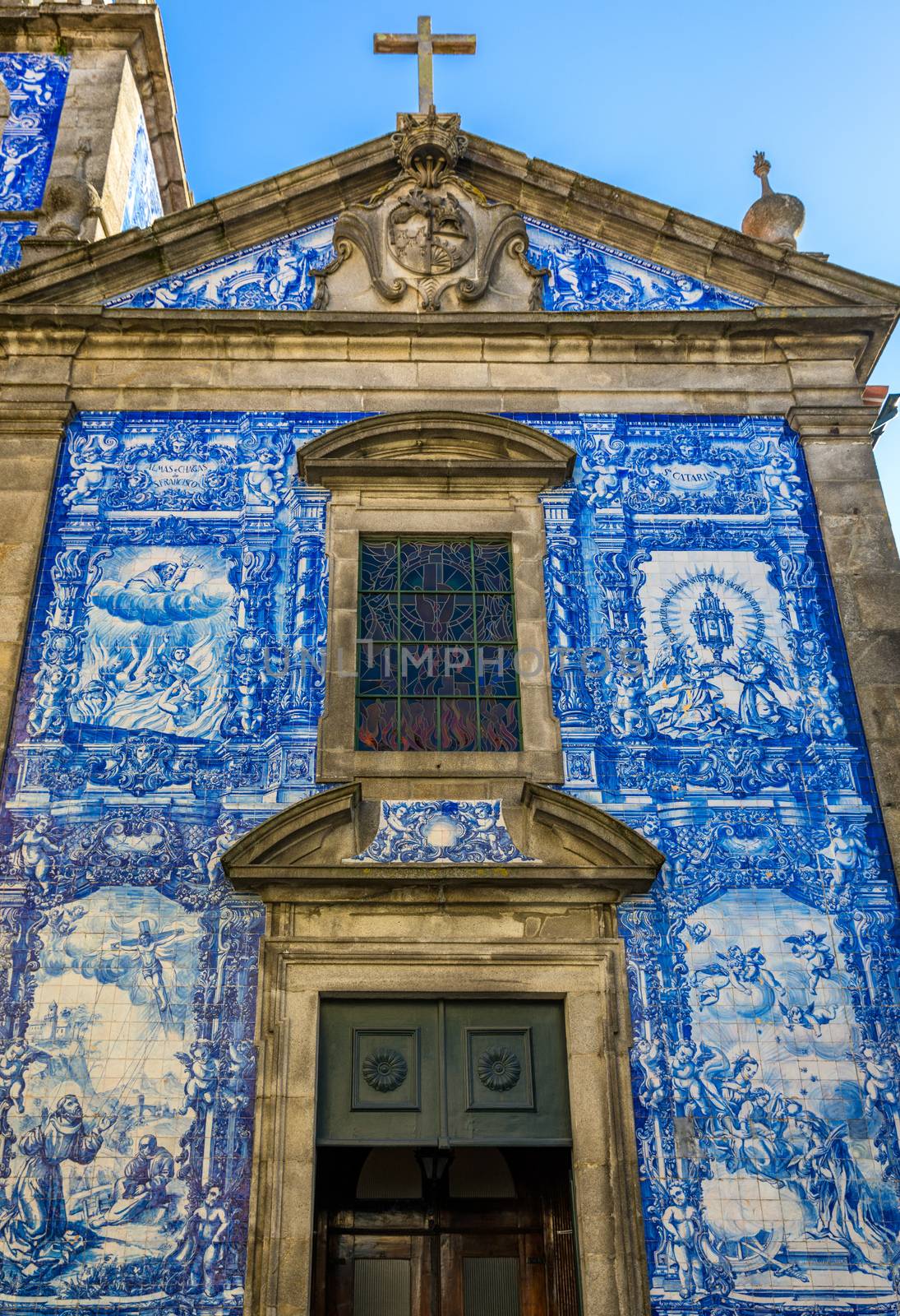 Traditional historic facade in Porto decorated with blue hand painted tin-glazed tiles, Oporto, Portugal