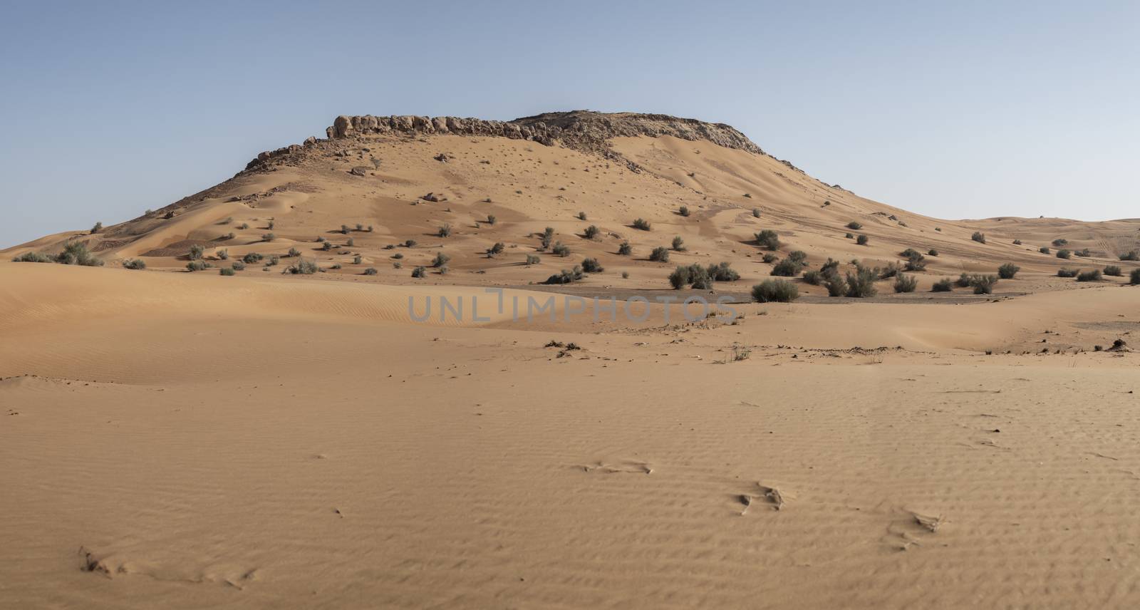 Mountain in the red sand desert of Sharjah, United Arab Emirates (UAE), Middle East