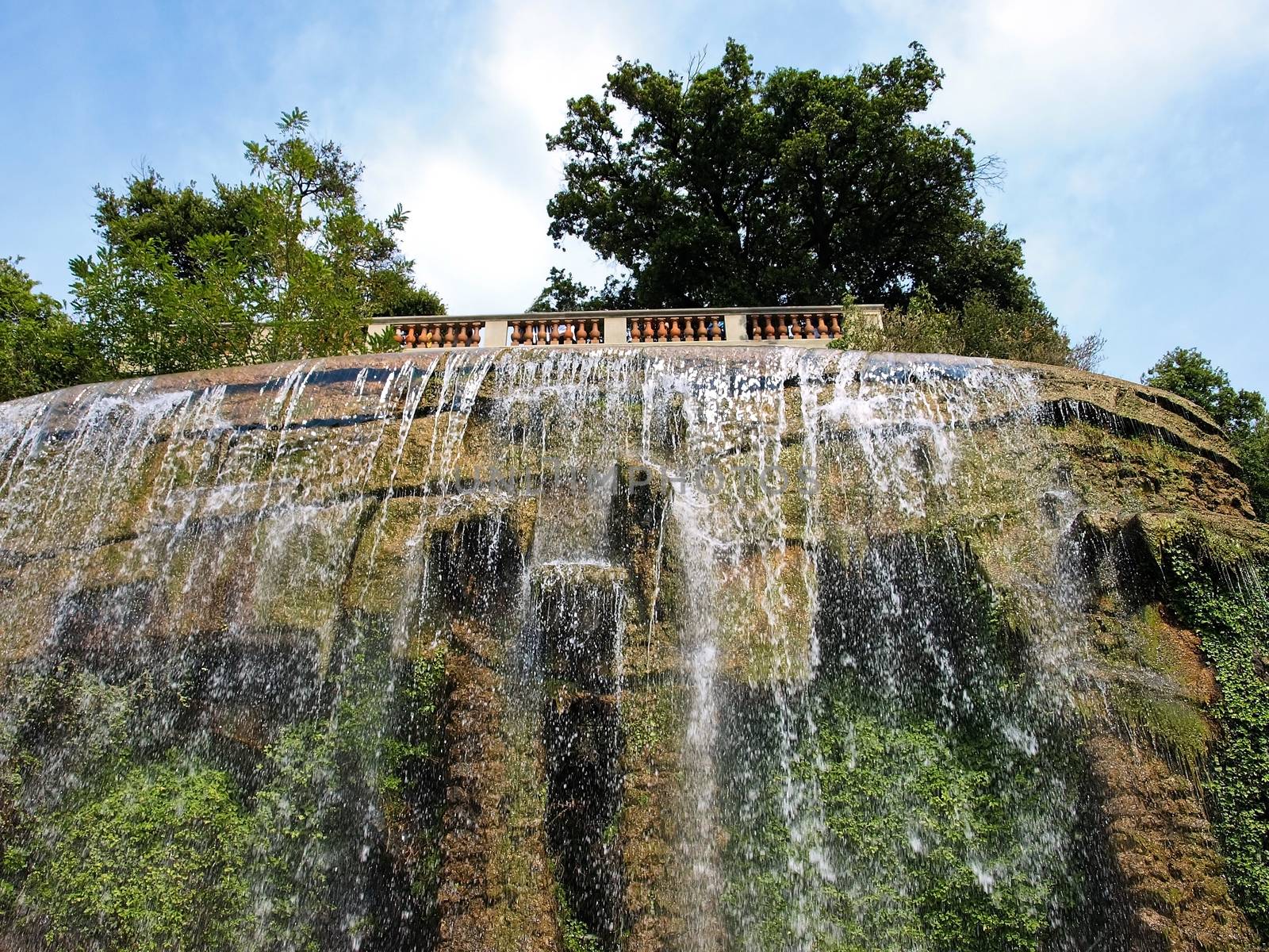 Large waterfall fountain in the La Chateau park in the southern French city of Nice.