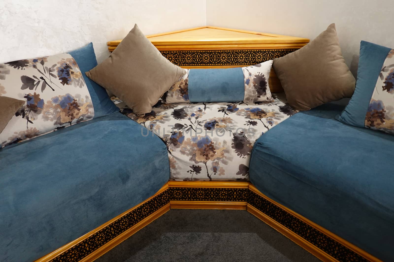 a traditional moroccan salon with a blue color.